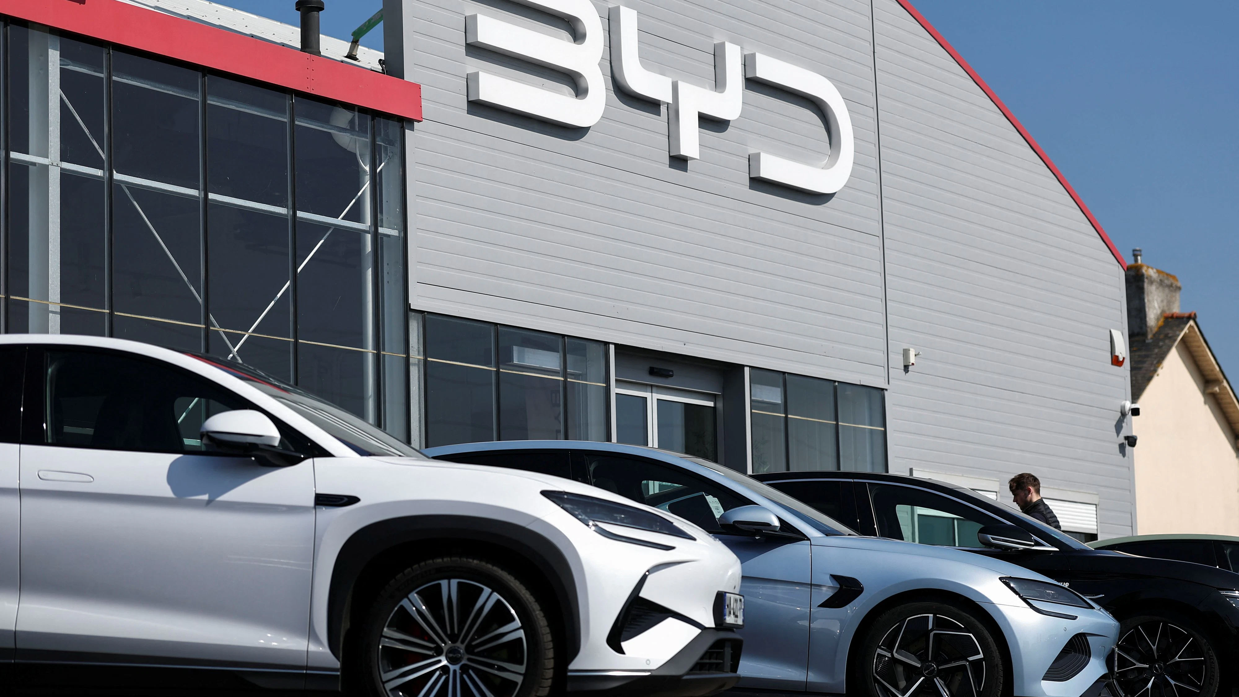 The logo of BYD is pictured at a dealership in Reze near Nantes, France, March 27, 2025. REUTERS/Stephane Mahe