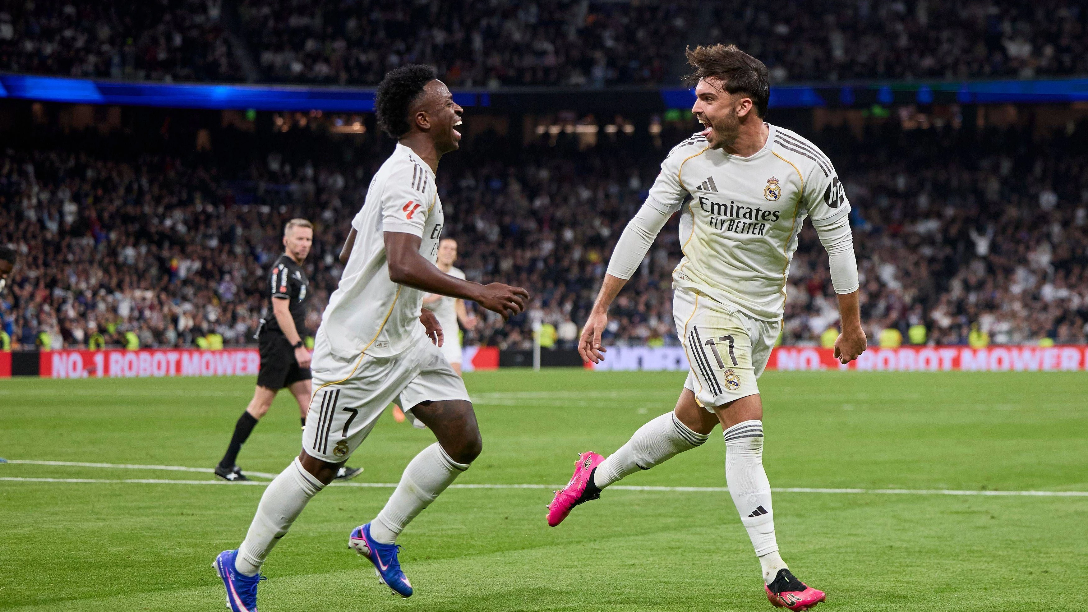 Raul Asencio of Real Madrid CF celebrates after scoring a goal with Vinicius Jr of Real Madrid CF Real Madrid v Real Betis, La Liga, Football, Estadio Bernabeu, Madrid, Spain - 04 Jan 2026Madrid Estadio Bernabeu Spain EDITORIAL USE ONLY No use with unauthorised audio, video, data, fixture lists, club/league logos or live services. Online in-match use limited to 120 images, no video emulation. No use in betting, games or single club/league/player publications. PUBLICATIONxINxGERxSUIxAUTxHUNxGRExMLTxCYPxROUxBULxUAExKSAxCHNxDENxINDxITAxPORxESPxSWExTURxMEXxCOLxVENxPERxECUxBRAxARGxCHIxURUxPARxPANxONLY Copyright: xRubenxAlbarran/Shutterstockx 16223631cj