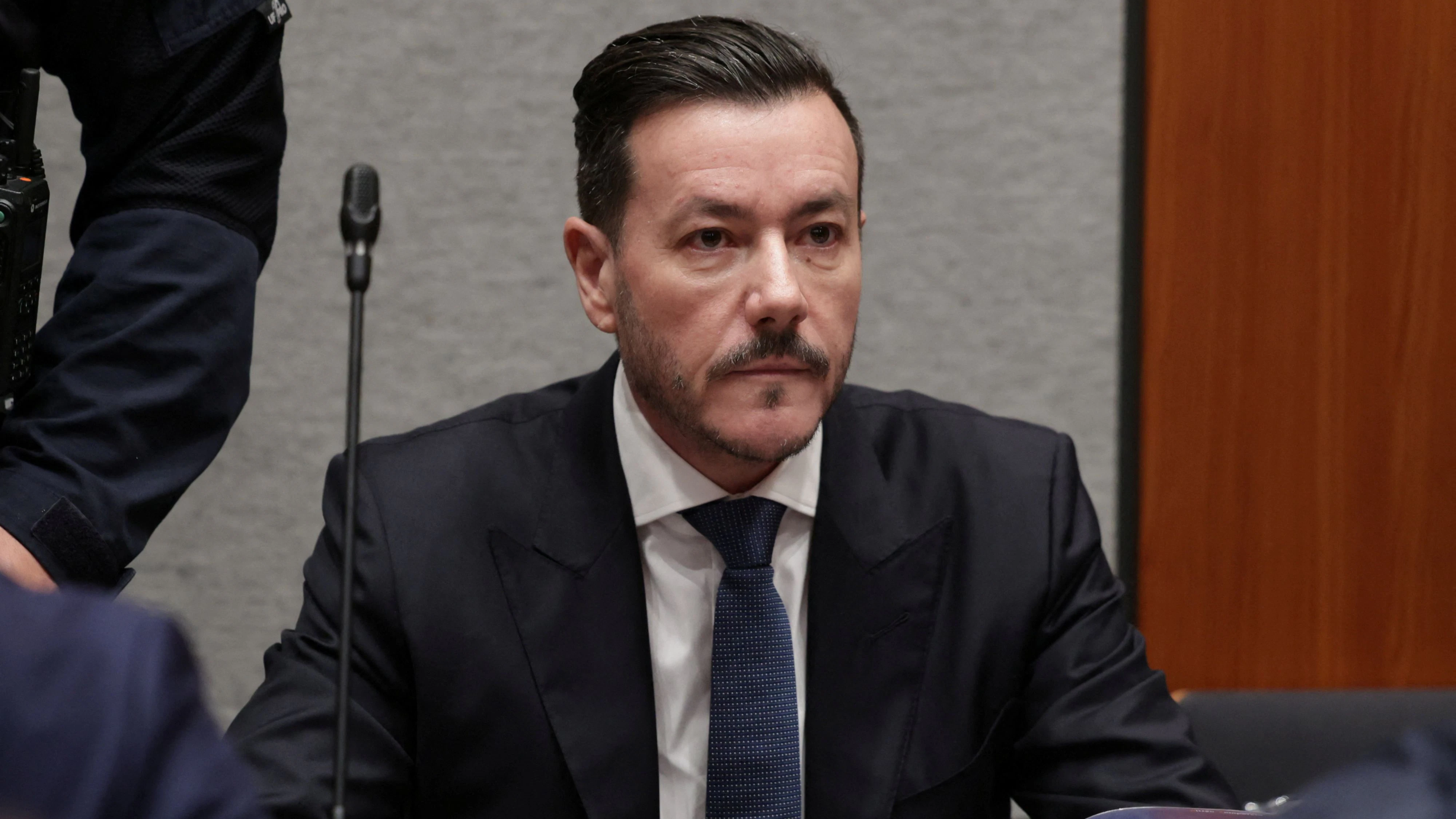 Austrian former billionaire Rene Benko waits for the start of his trial, in the first case tackling the collapse of his property group Signa, in a courtroom in Innsbruck, Austria, October 15, 2025. REUTERS/Leonhard Foeger