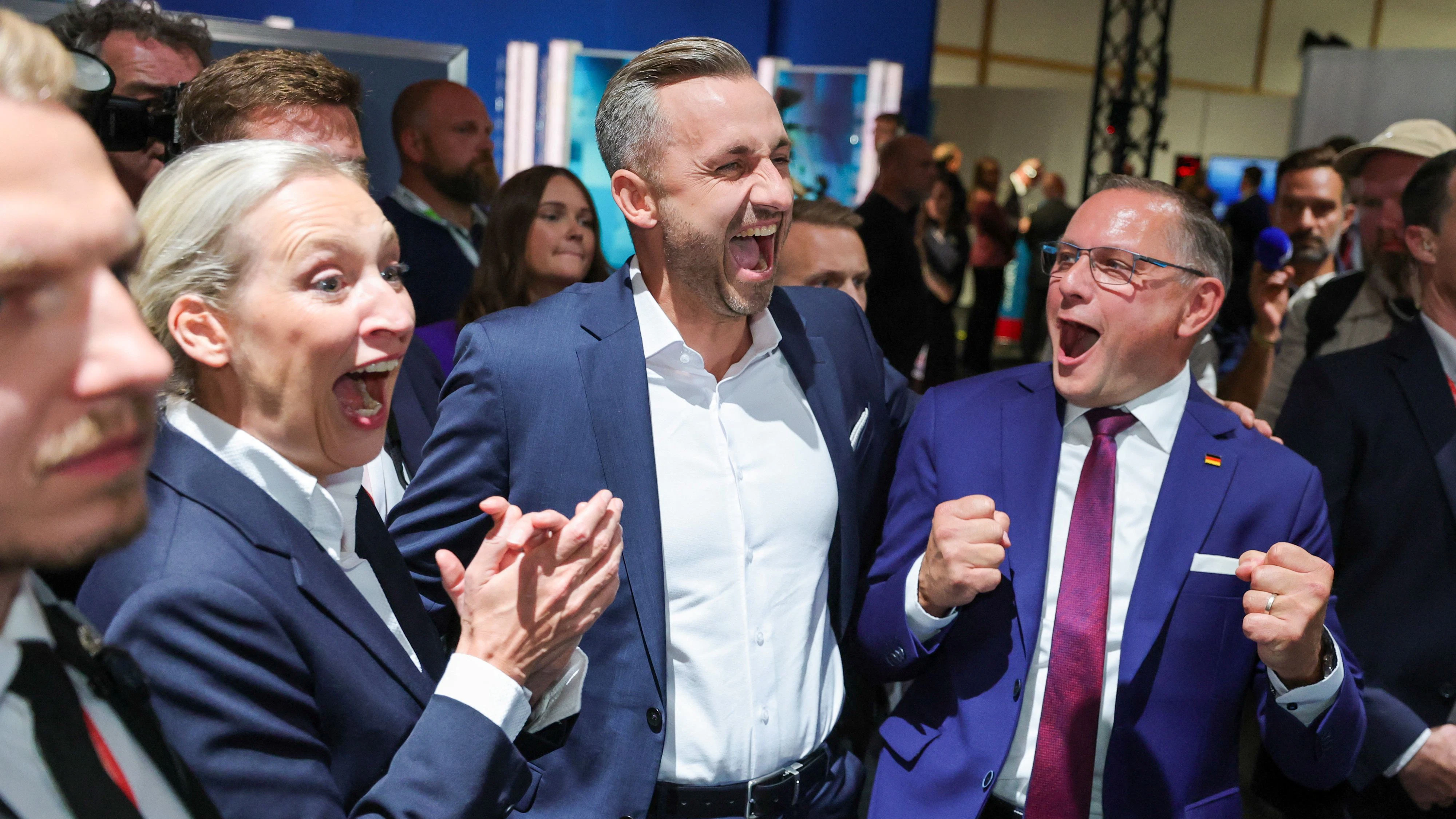 Top candidate of the far-right Alternative for Germany (AfD), Ulrich Siegmund, with party co leaders Alice Weidel and Tino Chrupalla, reacts after polls closed, on the day of the Saxony-Anhalt state elections, in Magdeburg, Germany, September 6, 2026. REUTERS/Fabrizio Bensch 
