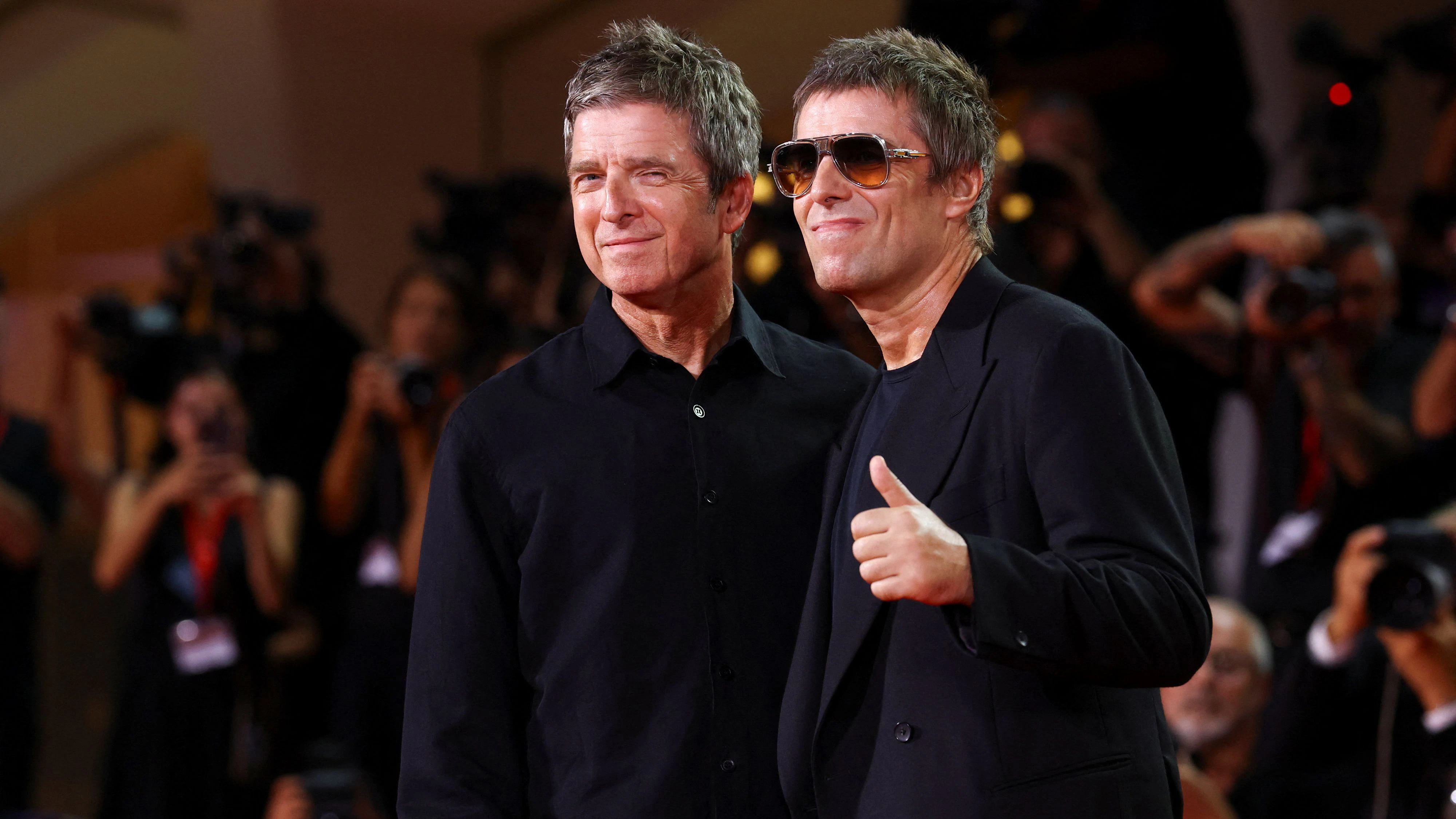  Liam Gallagher and Noel Gallagher pose on the red carpet during arrivals for the screening of the film "Oasis: Don't Look Back in Anger" in Venice Open – Out of Competition, at the 83rd Venice International Film Festival in Venice, Italy, September 5, 2026. REUTERS/Yves Herman