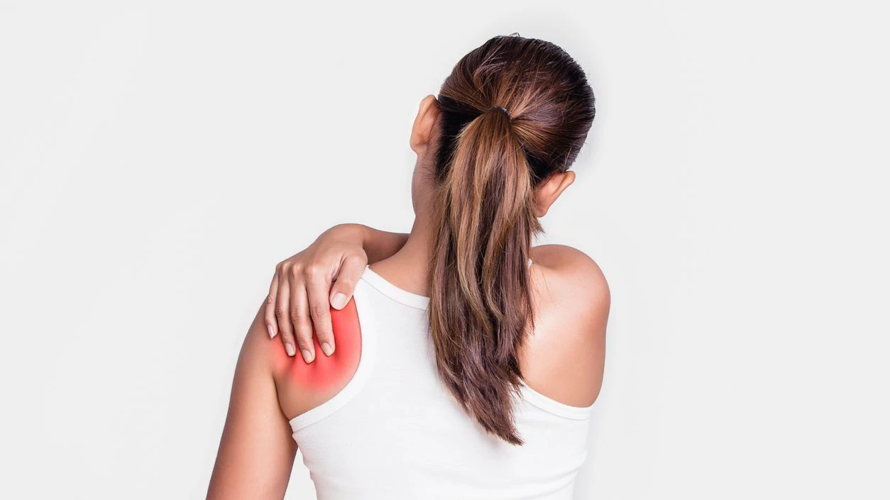 Asian woman with shoulder pain