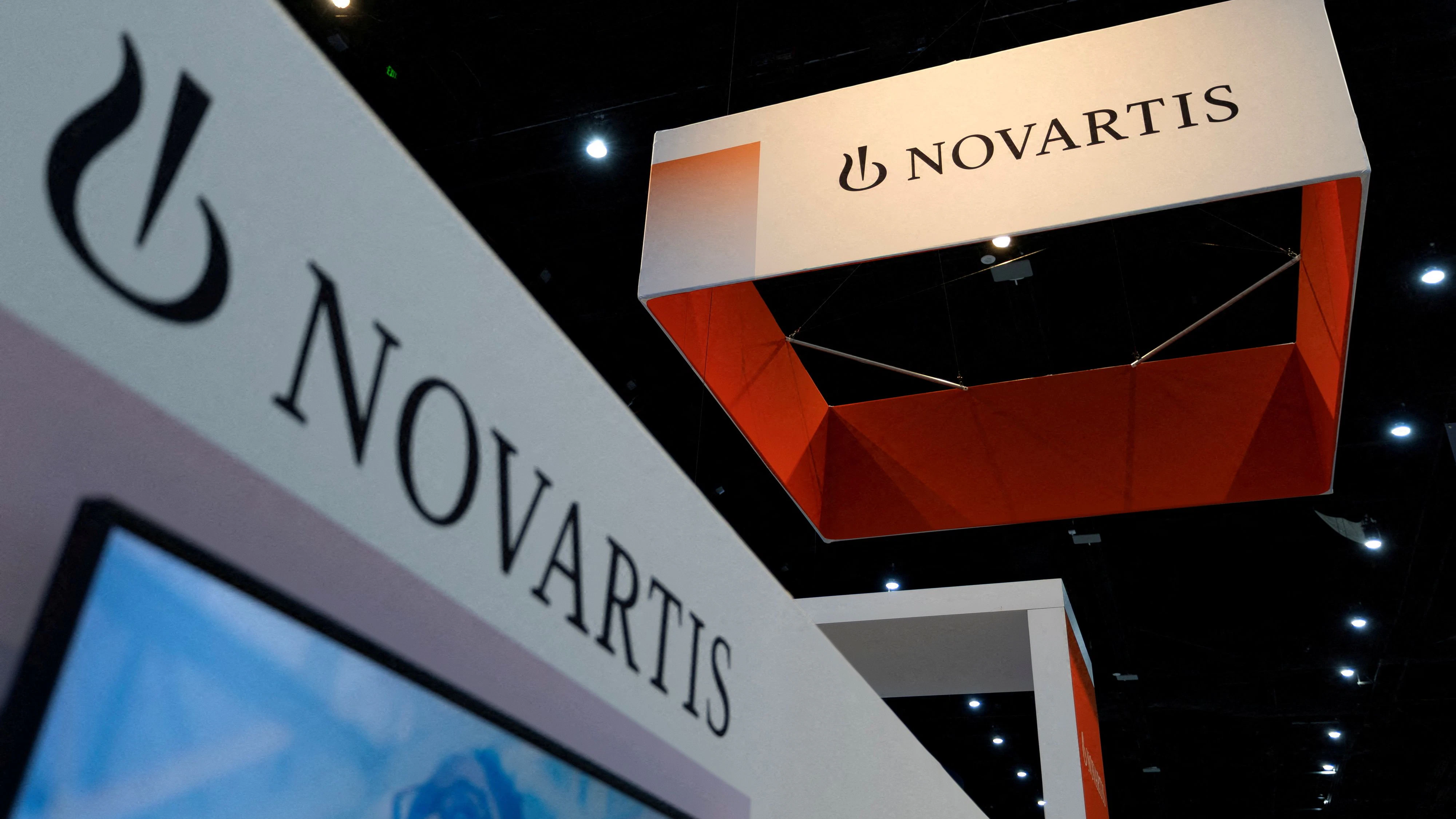 FILE PHOTO: A view of the Novartis booth and logo at the BIO International Convention 2026, a meeting of pharmaceutical and biotechnology leaders in San Diego, California, U.S. June 23, 2026. REUTERS/Mike Blake/File Photo