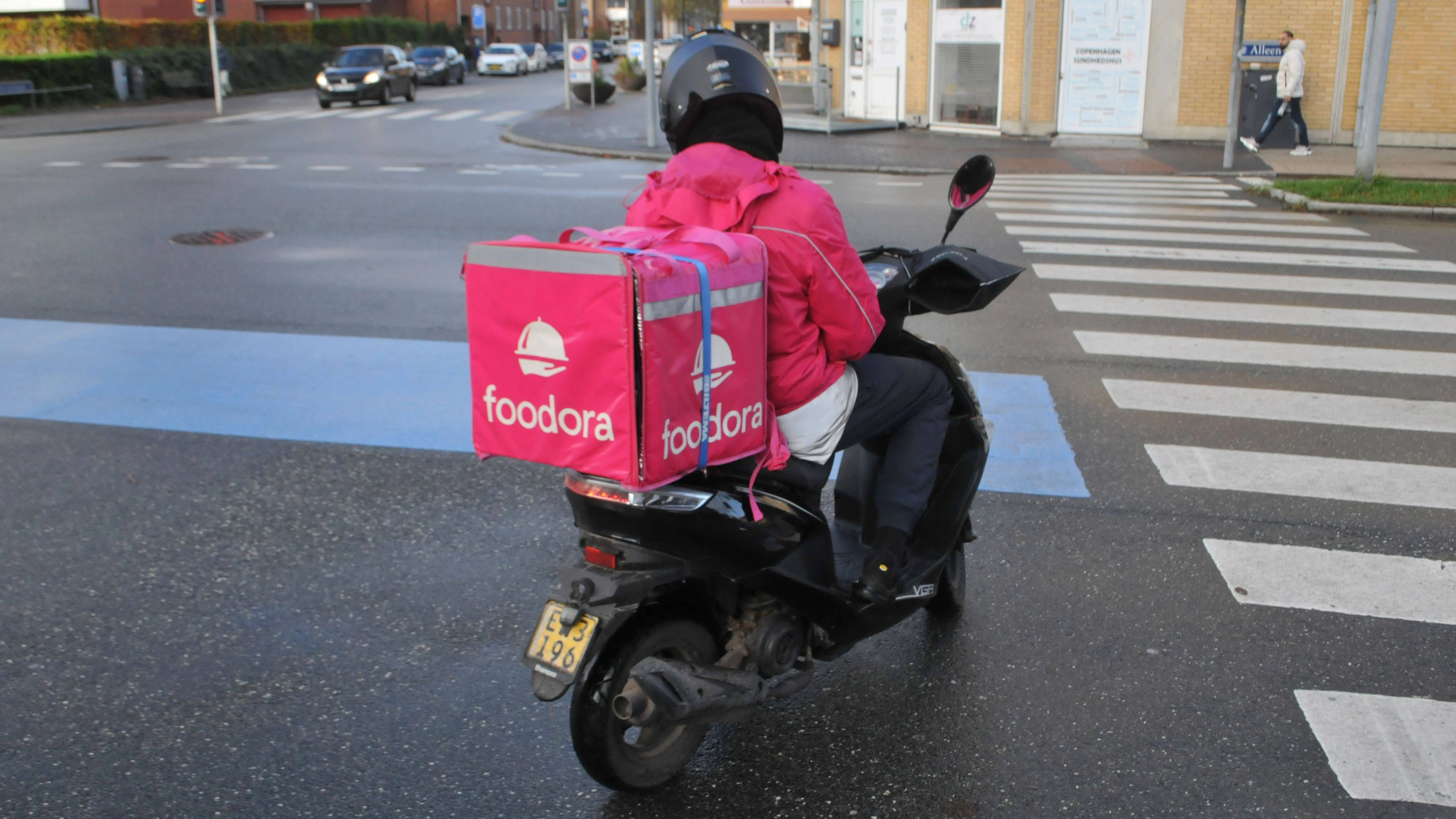 Copenhagen, Denmark /08 November 2023/. Foodora delivery biker and scooter male in danish capital. Photo.Francis Joseph Dean/Dean Pictures