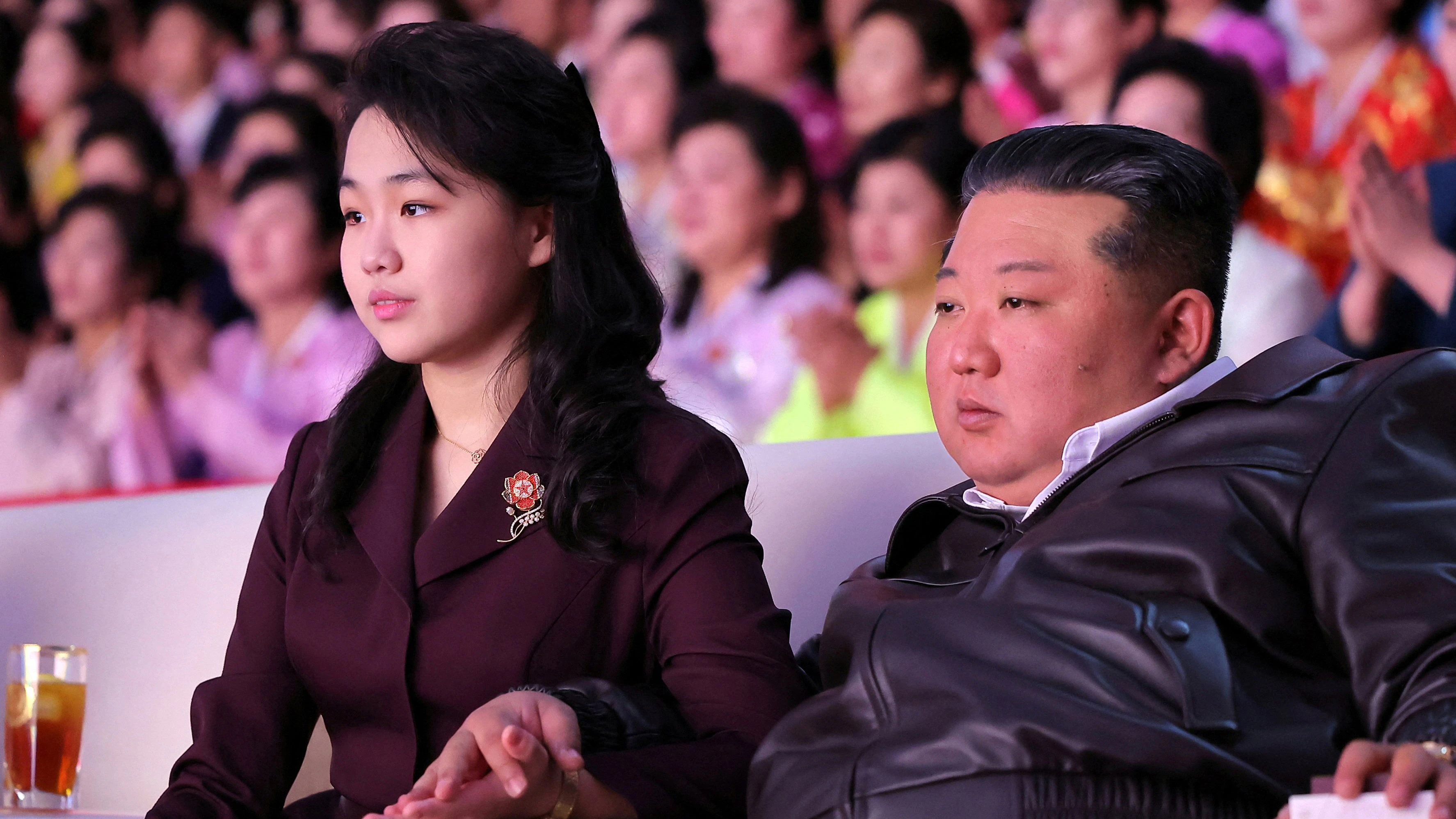 North Korean leader Kim Jong Un and his daughter Kim Ju Ae attend a performance commemorating International Women's Day in Pyongyang, North Korea, March 8, 2026, in this picture released by North Korea's official Korean Central News Agency.   KCNA via REUTERS    ATTENTION EDITORS - THIS IMAGE WAS PROVIDED BY A THIRD PARTY. REUTERS IS UNABLE TO INDEPENDENTLY VERIFY THIS IMAGE. NO THIRD PARTY SALES. SOUTH KOREA OUT. NO COMMERCIAL OR EDITORIAL SALES IN SOUTH KOREA.     TPX IMAGES OF THE DAY     