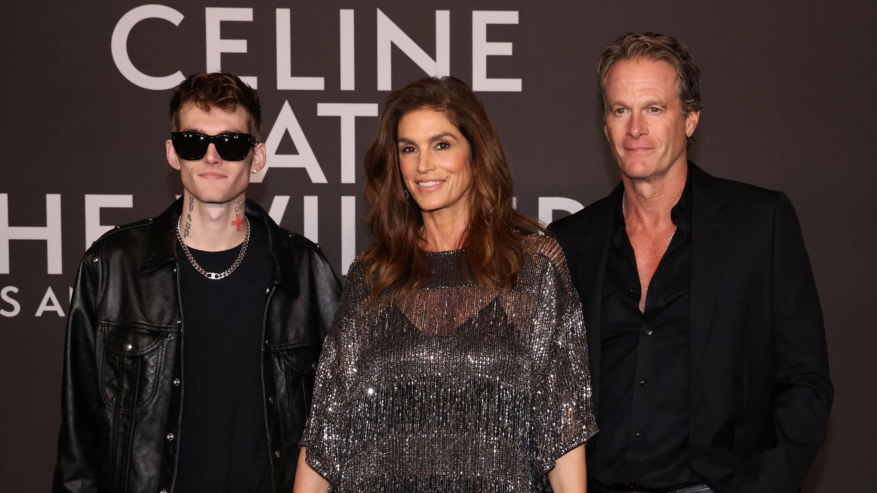 Cindy Crawford with her husband Rande Gerber and son Presley Walker Gerber attend the Celine Fall Winter 2023 fashion show at The Wiltern theatre in Los Angeles, California, U.S., December 8, 2022. 