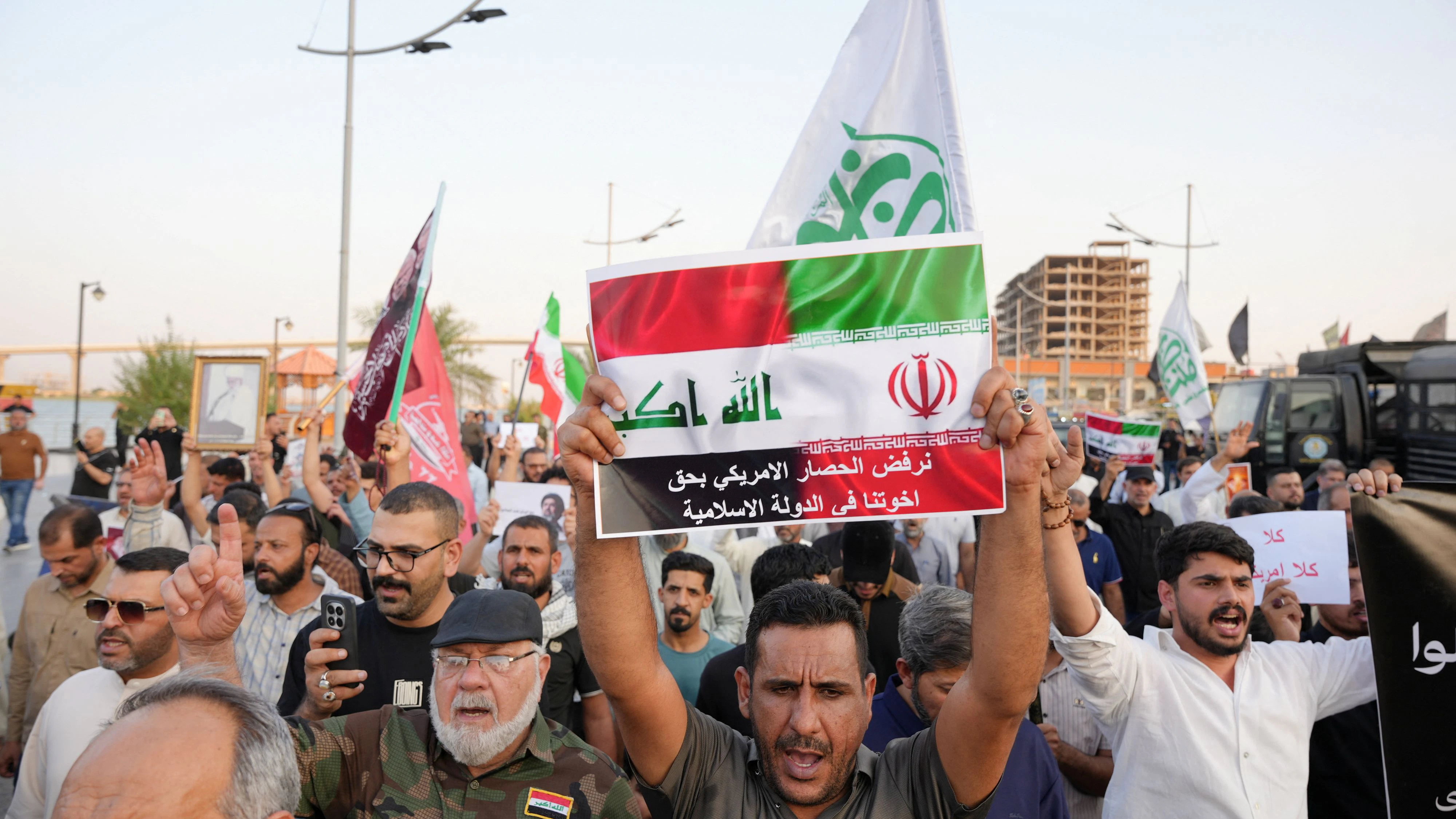 Protesters gather during a demonstration against US restrictions targeting Iranian aviation activities and their impact on flights between Iran and Iraq, on the Basra Corniche in Basra, Iraq, September 26, 2026. REUTERS/Essam Al-Sudani 