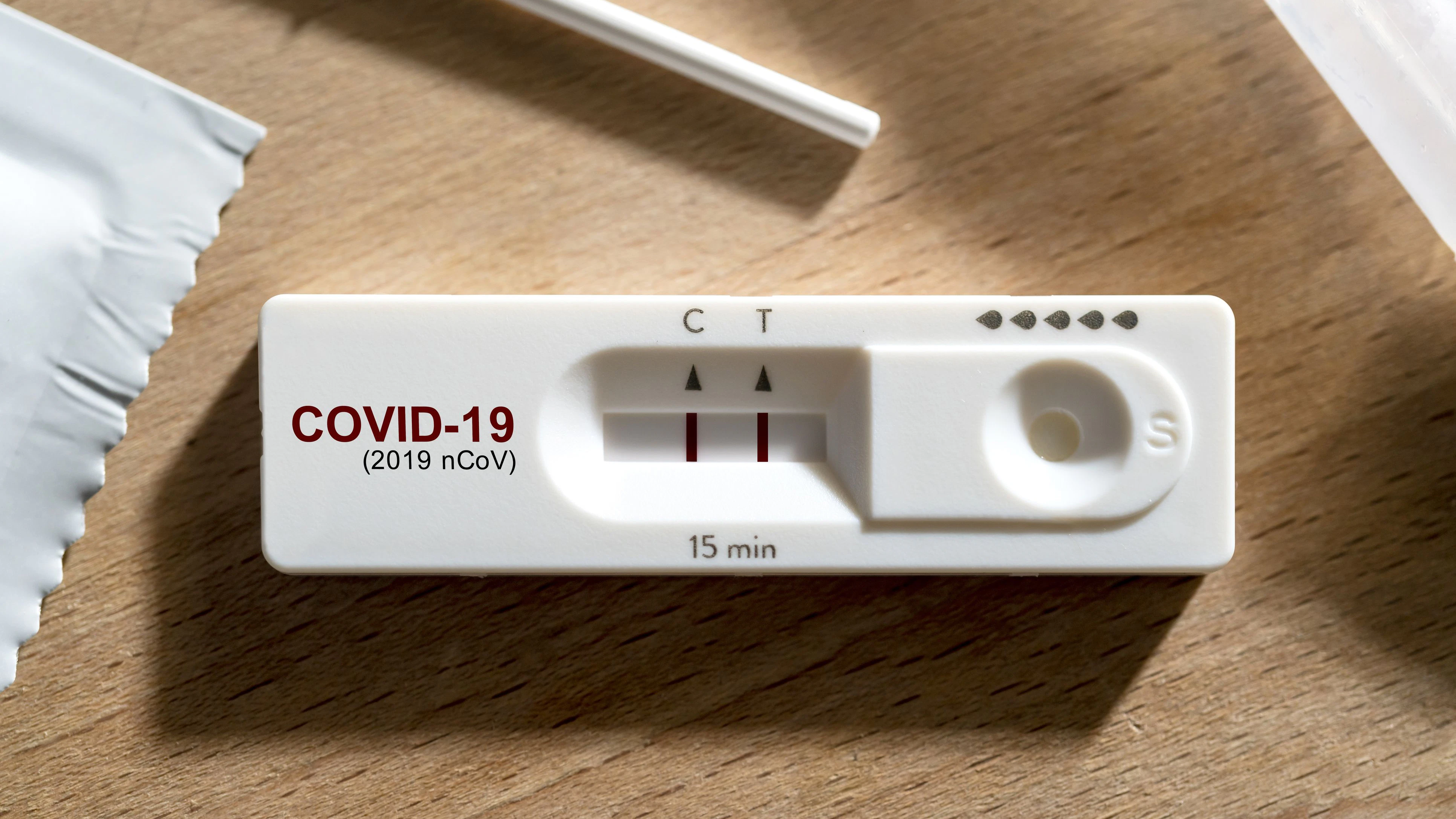 close up positive show result of covid infected show on nasal rapid self test kit at home