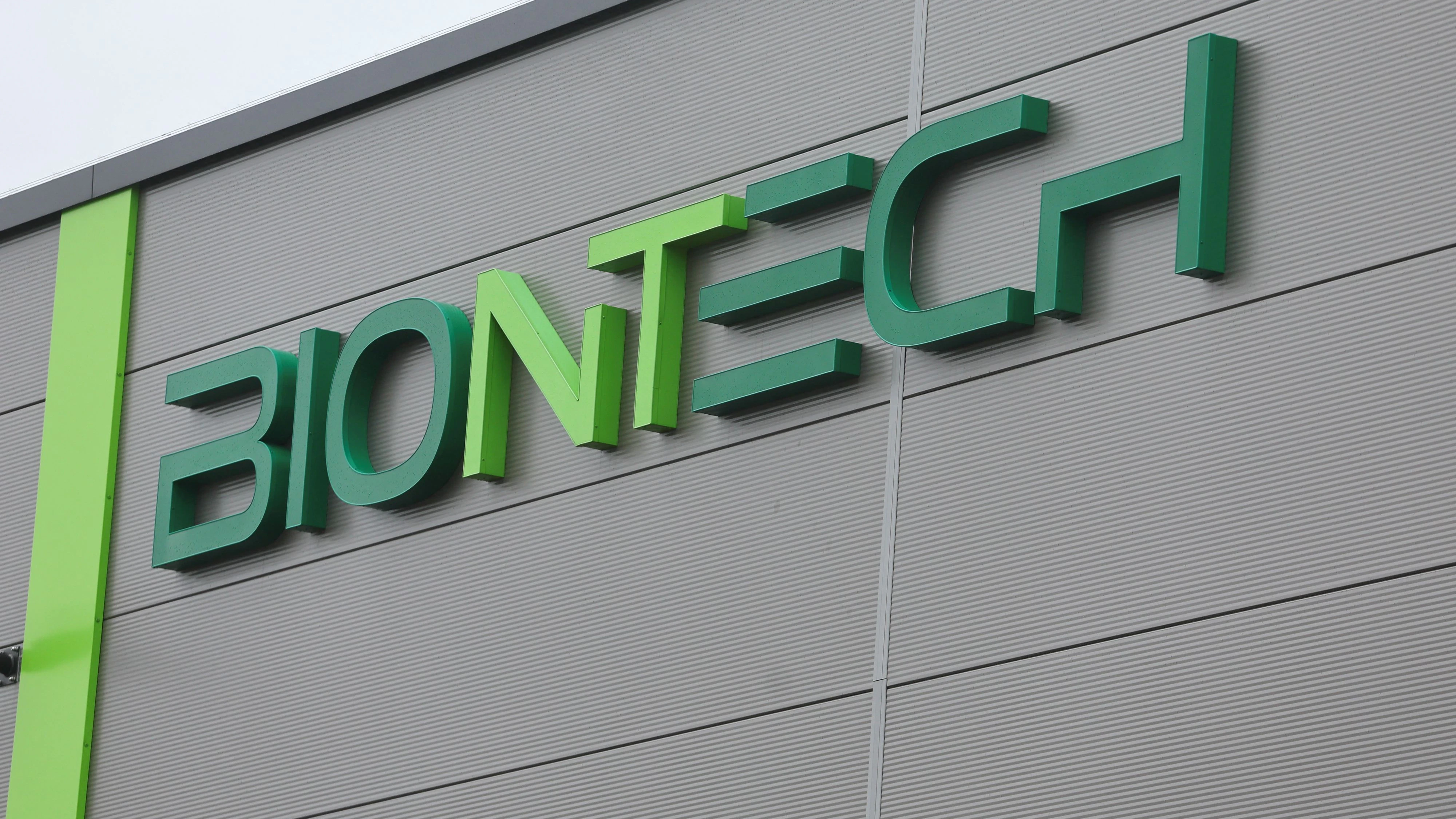 The logo of BioNTech is pictured at Biontech's research laboratory for individualised vaccines against cancer in Mainz, Germany, July 27, 2023. REUTERS/Wolfgang Rattay