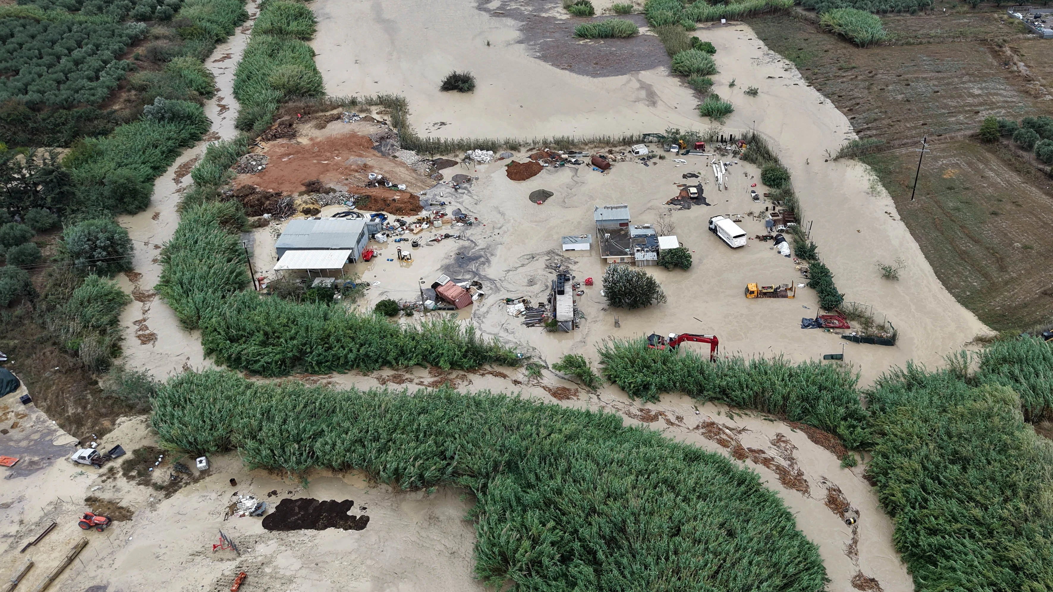 A drone view of a flooded area, after heavy rain affected parts of Crete, prompting authorities to maintain severe weather warnings, in Malades, near Iraklio, Crete island, Greece, October 1, 2026. REUTERS/Stefanos Rapanis
