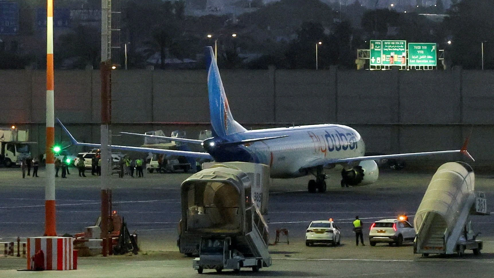 A plane, carrying passengers who were on the FlyDubai aircraft bound for Israel from the United Arab Emirates, which was diverted to Saudi Arabia following an emergency signal, on the tarmac as it arrives at the Ben Gurion International Airport, in Lod, near Tel Aviv, Israel, September 30, 2026. REUTERS/Ammar Awad     TPX IMAGES OF THE DAY     