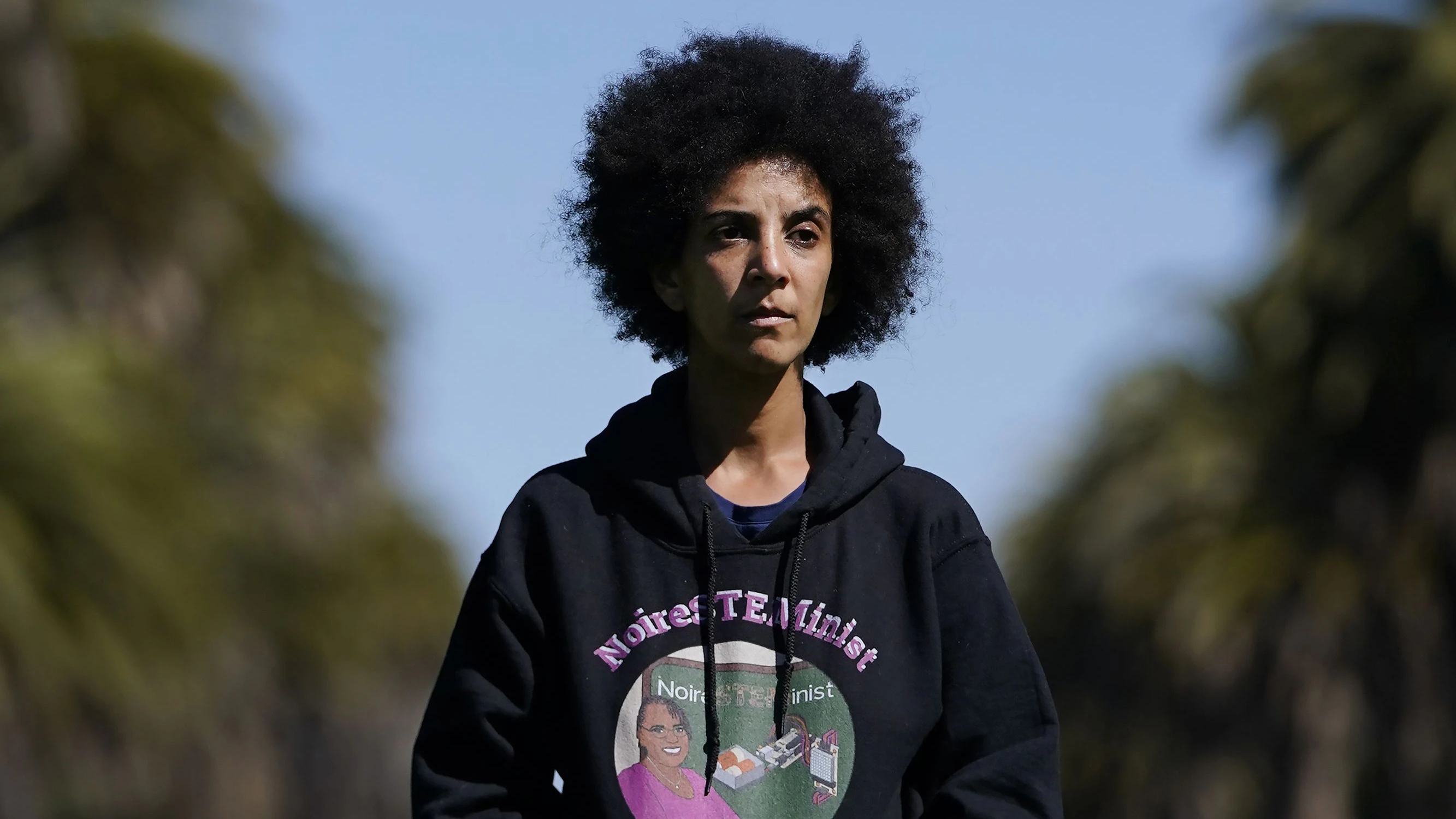 Timnit Gebru poses for a photo in Stanford, Calif., Monday, March 21, 2022. When she co-led Google's Ethical AI team, Gebru was a prominent insider voice questioning the tech industry's approach to artificial intelligence. Now Gebru is trying to make change from the outside as the founder of the Distributed Artificial Intelligence Research Institute, or DAIR. (AP Photo/Jeff Chiu)