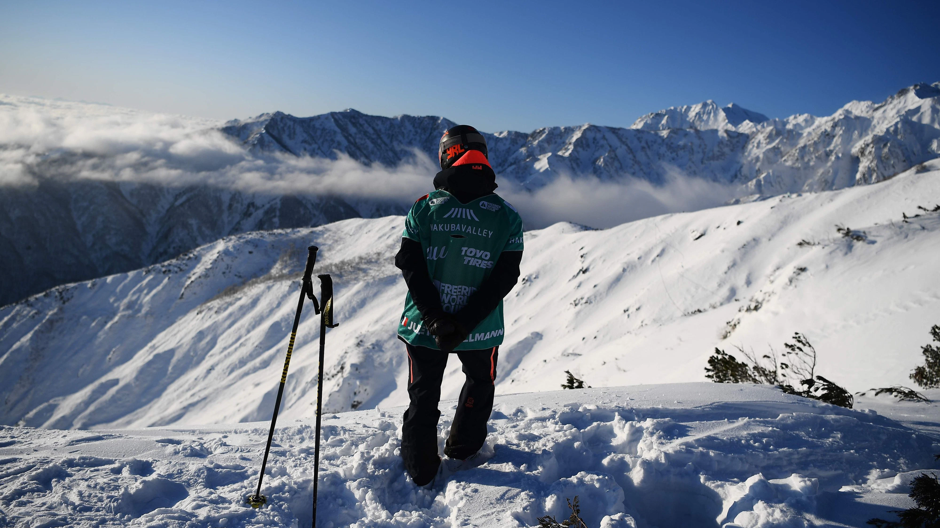 This picture taken on January 19, 2020 shows Juliette Willmann of France looking at the "face" before competing the women's classification event for the FreeRide World Tour skiing competition in Hakuba, western Japan. (Photo by CHARLY TRIBALLEAU / AFP) / TO GO WITH STORY by Sabine COLPART