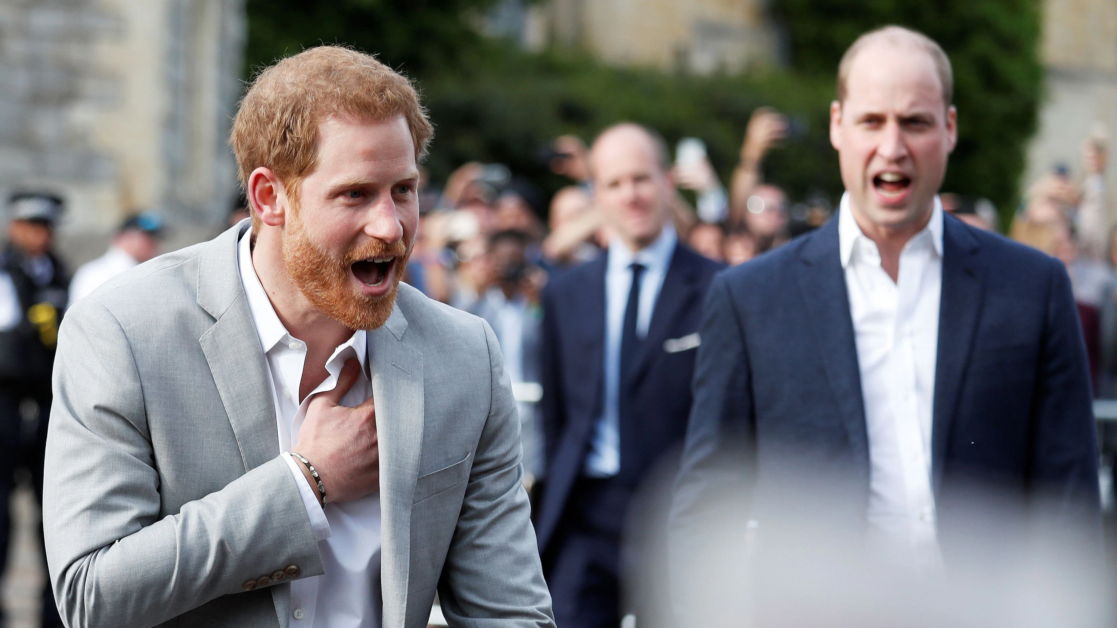 Britain's Princes Harry and William greet wellwishers outside Windsor Castle ahead of Harry's wedding to Meghan Markle tomorrow, in Windsor, Britain, May 18, 2018. REUTERS/Damir Sagolj