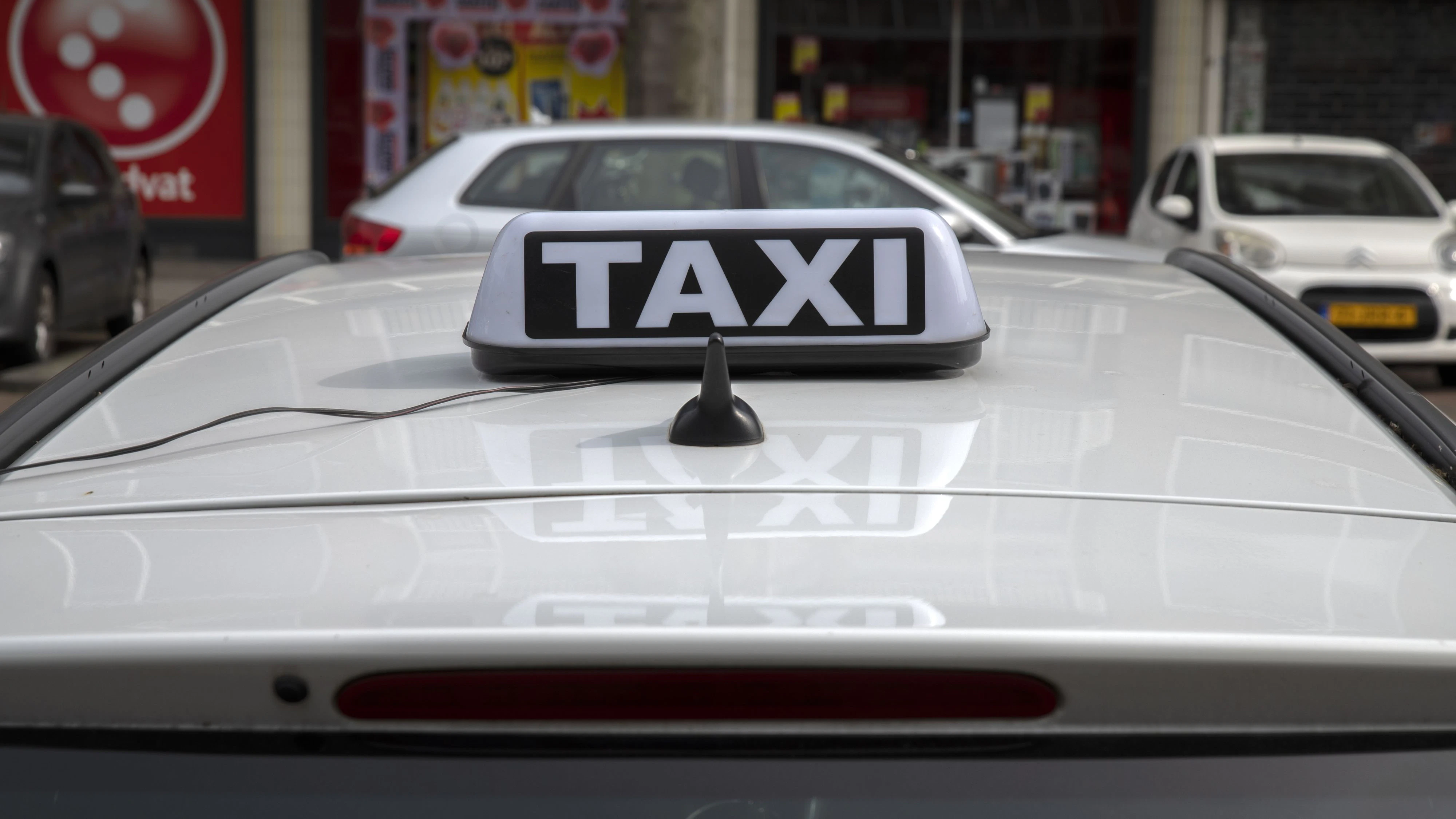 General Taxi Sign On A Roof At Amsterdam The Netherlands 27-4-2023   xkwx advertising amsterdam attraction back backside billboard close up close-up closeup company design dutch emblem europe european famous hang holland icon information isolate isolated logo netherlands outdoor outdoors outside roof sign street taxi tourism tourist transport transportation general white black