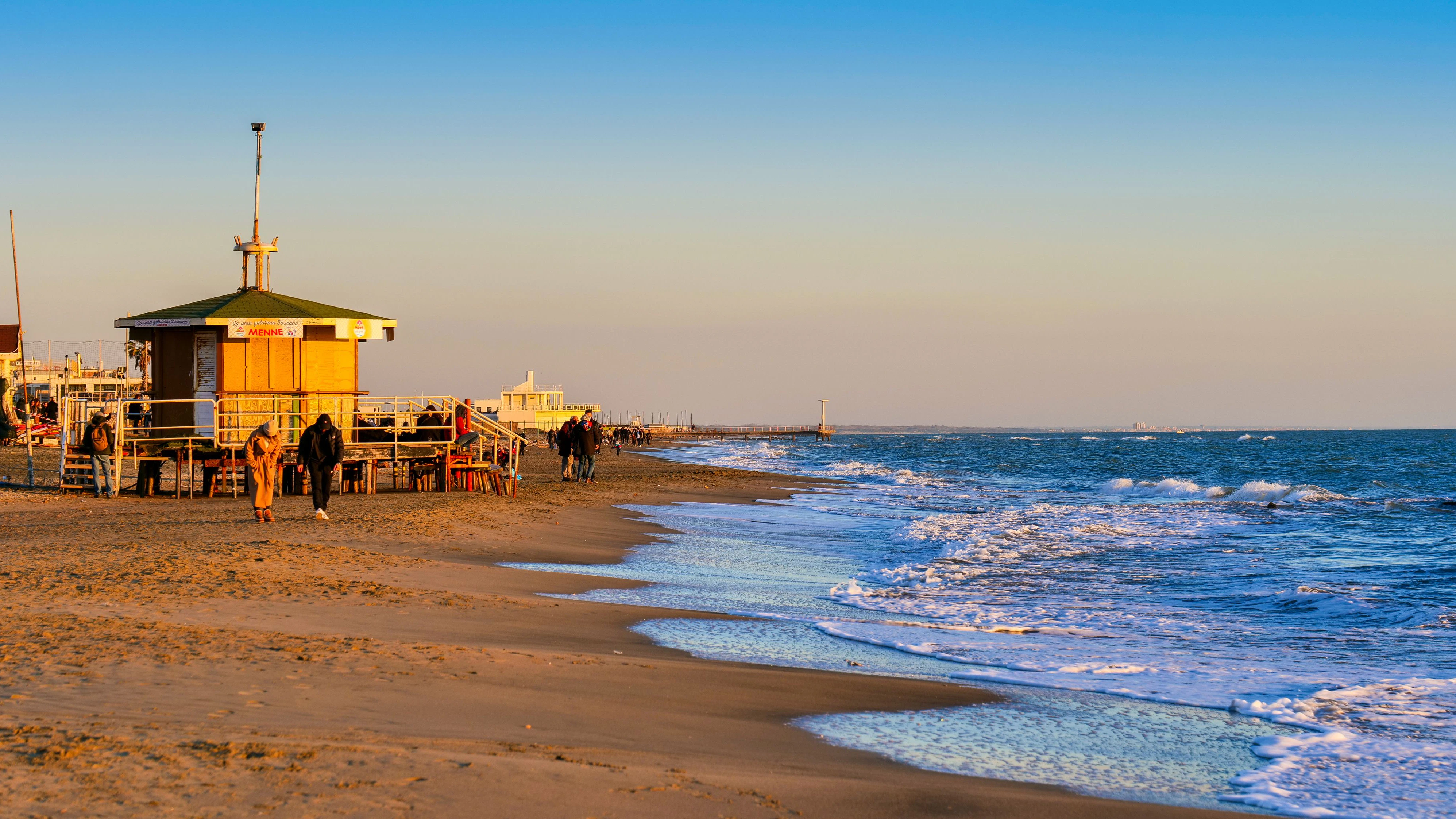 Ostia Lido (Rome), Italy, January 13 -- The sunset light illuminates the beach of Ostia Lido, the seaside district of the city of Rome on the Tyrrhenian coast, thirty kilometers from the center of the Italian capital. Image in High Definition format.