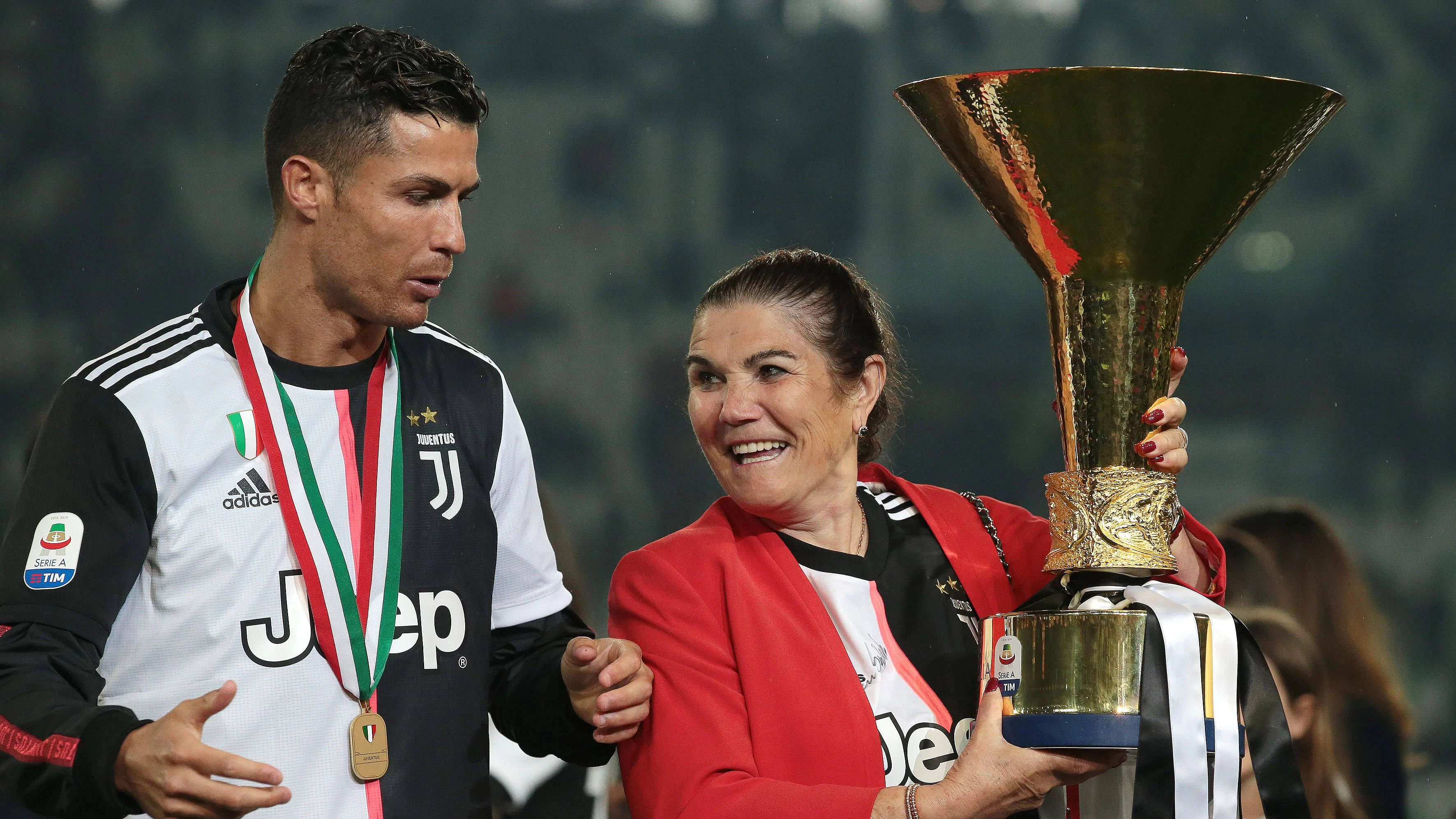 Juventus v Atalanta - Serie A - Allianz Stadium May 19, 2019 - Turin, United Kingdom - Cristiano Ronaldo of Juventus and his mother Maria Dolores dos Santos Aveiro pictured with the trophy following the Serie A match at Allianz Stadium, Turin. Picture date: 19th May 2019. Picture credit should read: Jonathan Moscrop/Sportimage Turin United Kingdom EDITORIAL USE ONLY Copyright: xx ZUMA-20190519_zaf_si1_078.jpg JonathanxMoscropx csmphototwo537221