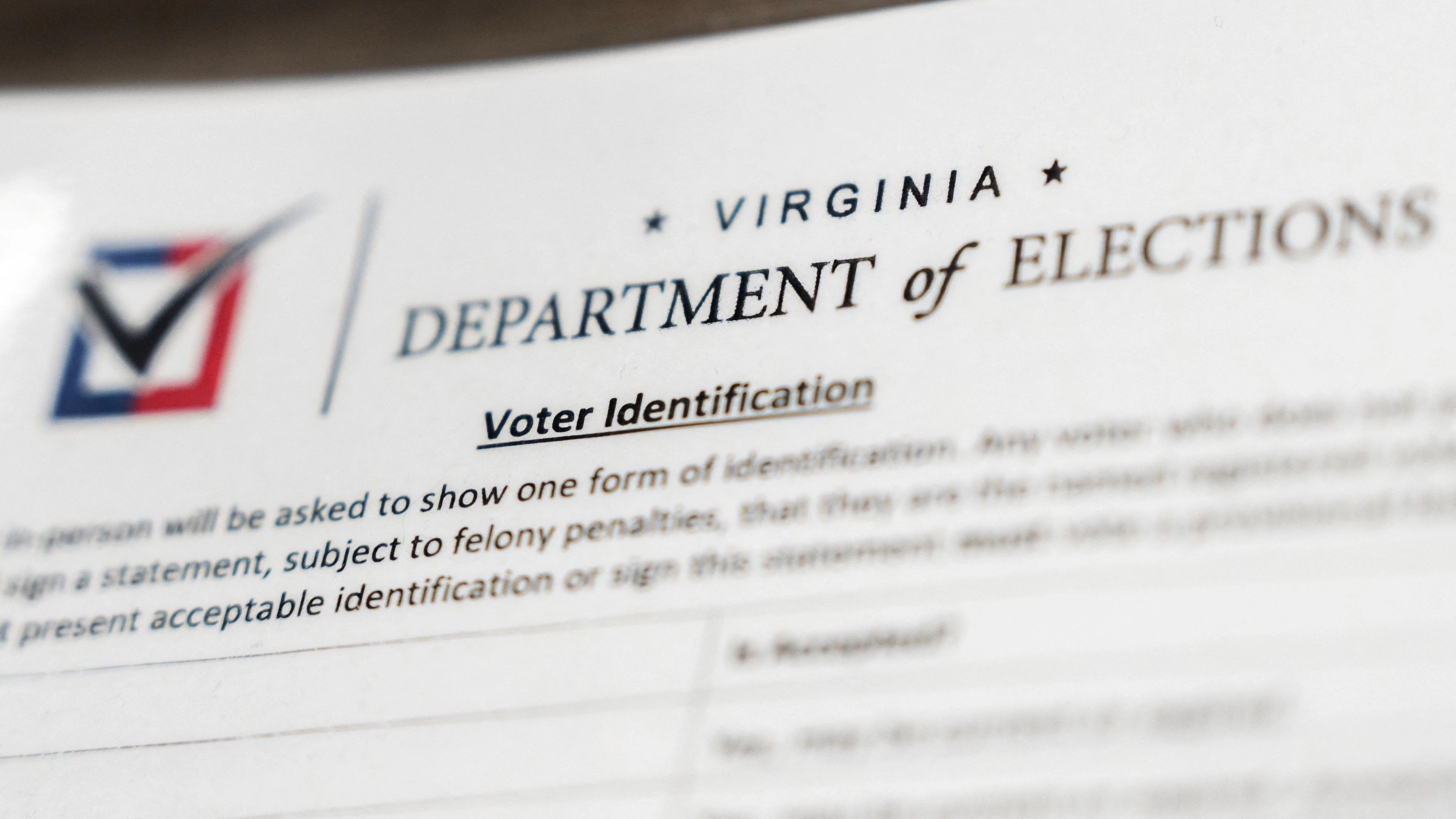 A form outlining voter identification standards during early voting at the Alexandria City Registrar Office in Alexandria, Virginia, US, October 7, 2026. REUTERS/Nathan Howard