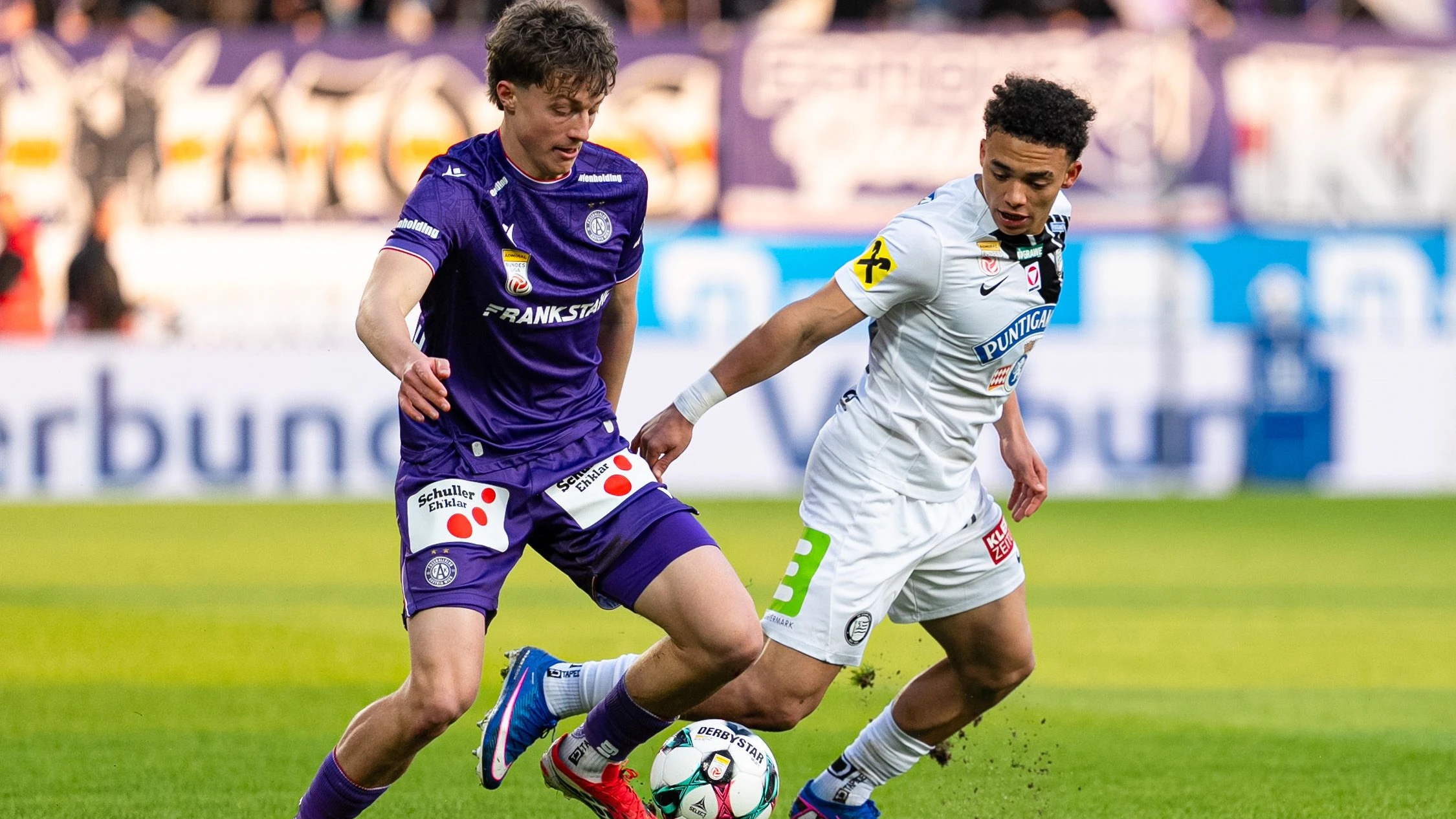 VIENNA,AUSTRIA,15.MAR.26 - SOCCER - ADMIRAL Bundesliga, championship group, FK Austria Wien vs SK Sturm Graz. Image shows Matteo Schablas (A. Wien) and Jacob Hoedl (Sturm). Photo: GEPA pictures/ Kevin Kada