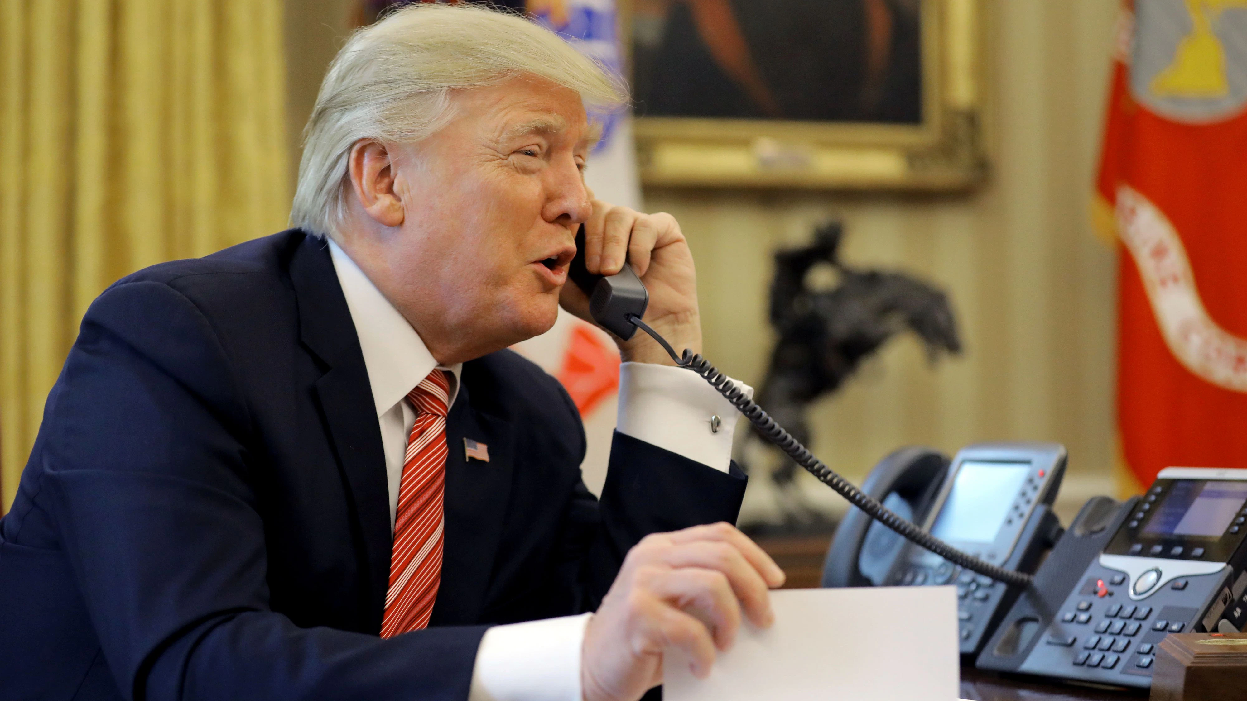 U.S. President Donald Trump congratulates Prime Minister Leo Varadkar of Ireland, during a phone call at the Oval Office of the White House in Washington, U.S., June 27, 2017. REUTERS/Carlos Barria
