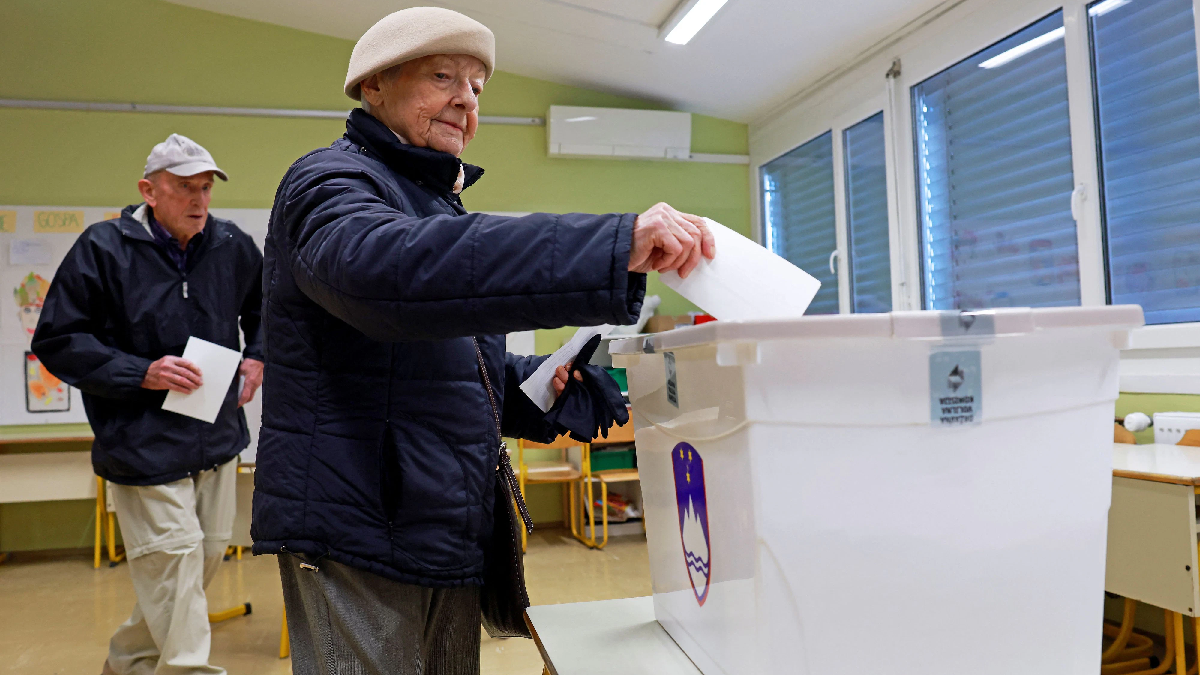 People vote at a polling station during a referendum vote on a law that proposes legalising assisted dying for some terminally ill adults, in Ljubljana, Slovenia, November 23, 2025. Borut Zivulovic/REUTERS
