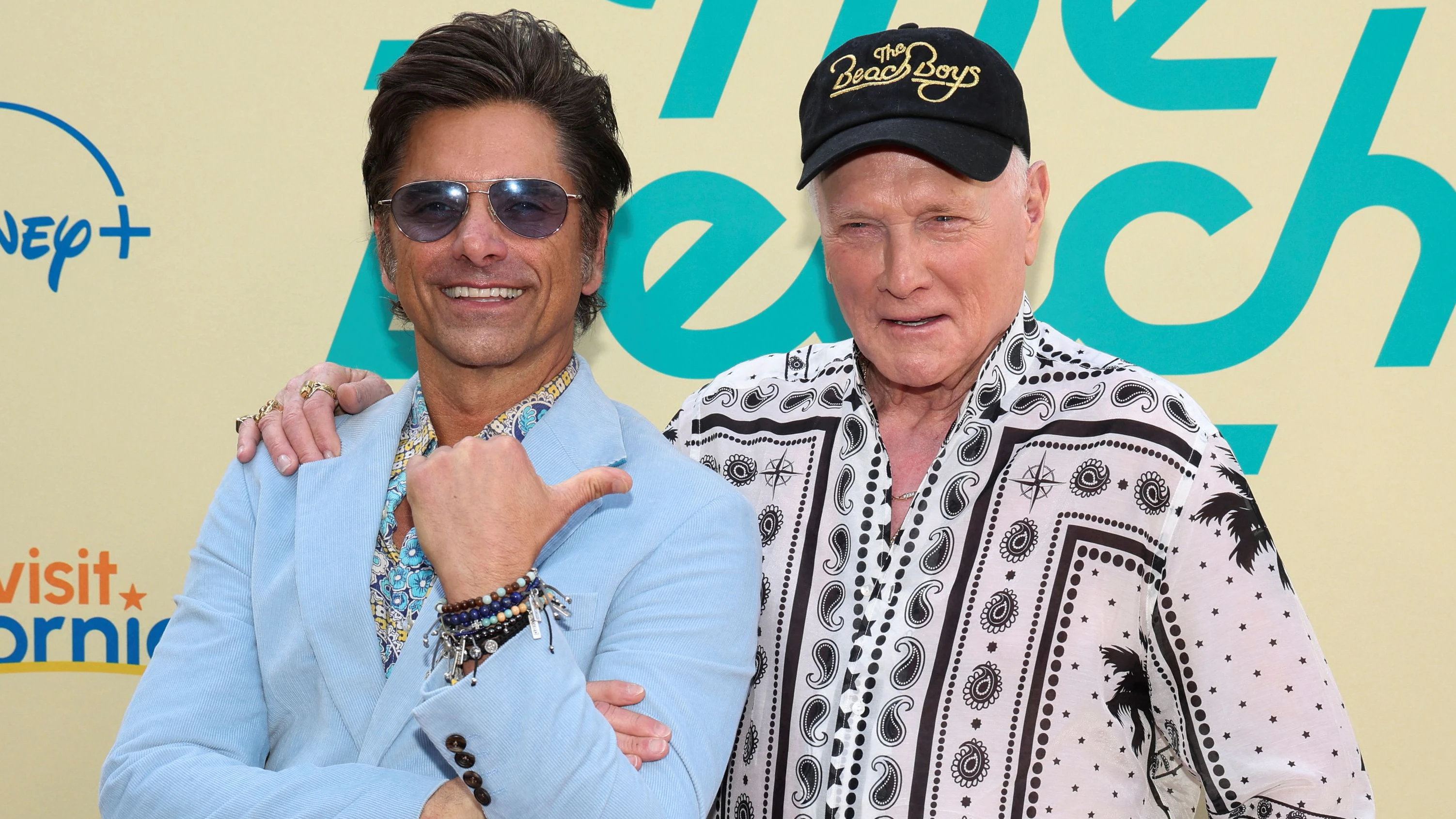 Mike Love and John Stamos attend the world premiere of the documentary "The Beach Boys" at TCL Chinese Theatre in Los Angeles, California, U.S., May 21, 2024. REUTERS/Mario Anzuoni
