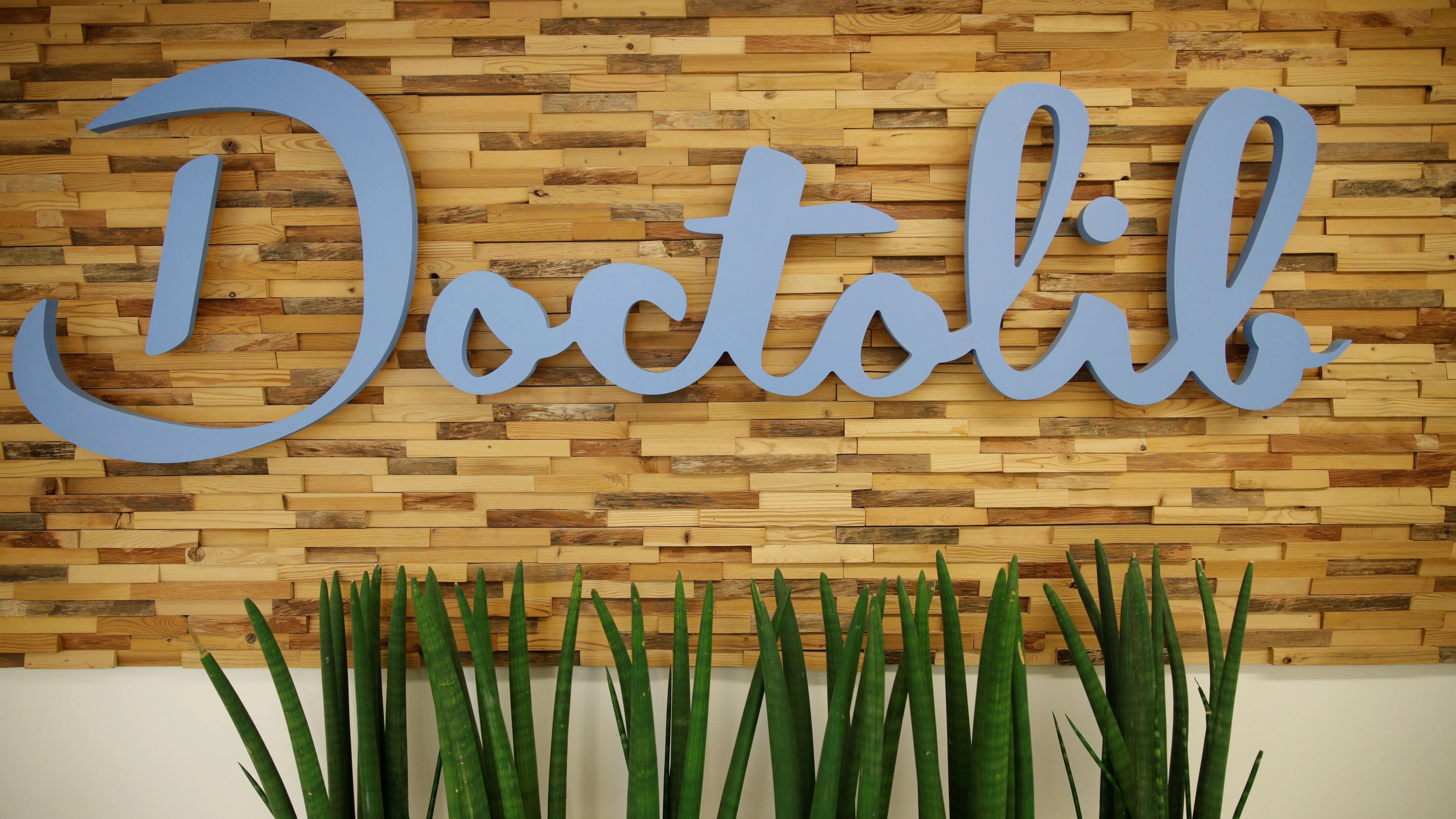 A logo of Franco-German online medical appointements booking platform Doctolib is seen at their headquarters in Paris, France, March 20, 2019. REUTERS/Philippe Wojazer