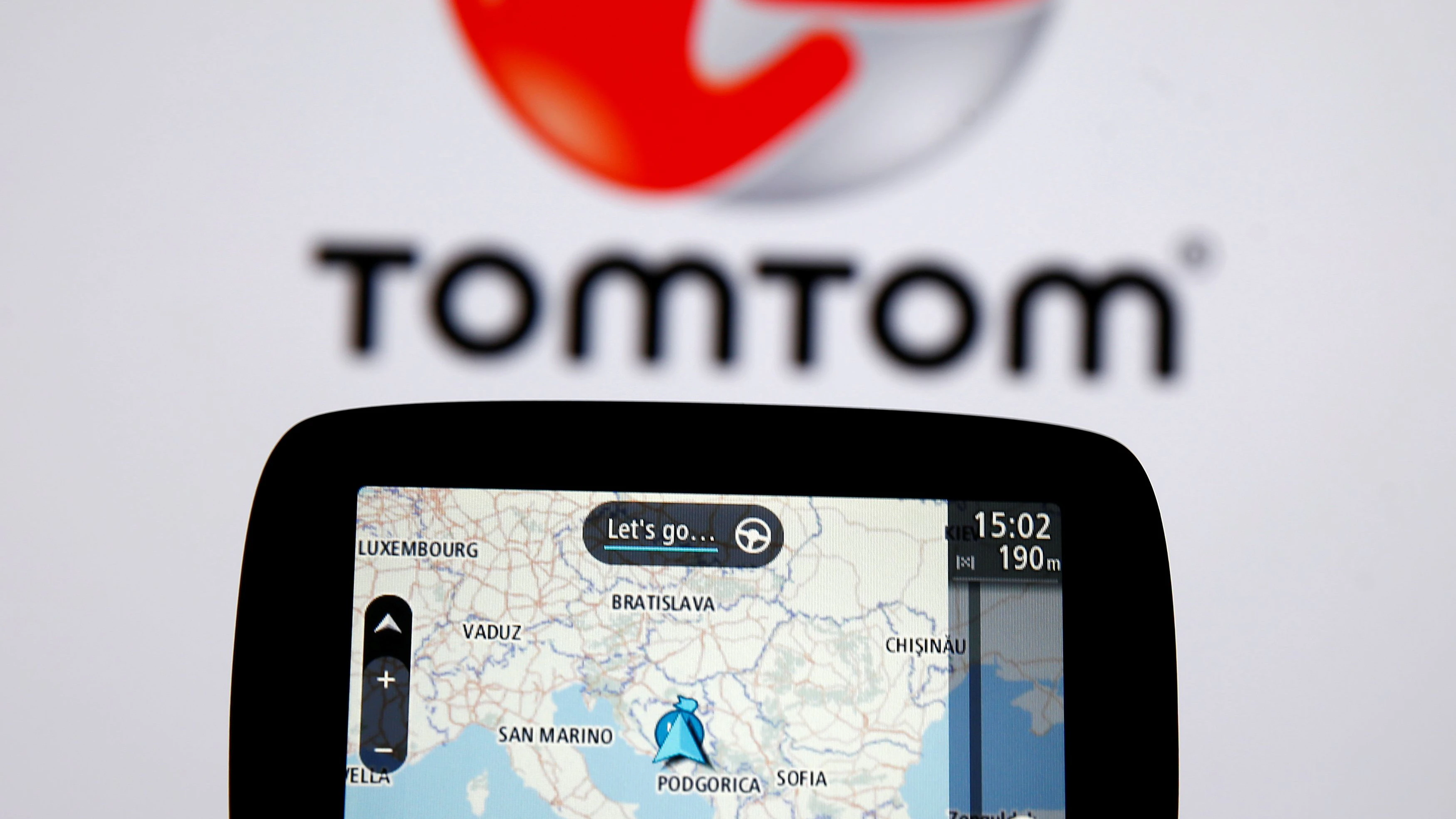 TomTom navigation are seen in front of TomTom displayed logo in this illustration taken July 28, 2017. REUTERS/Dado Ruvic