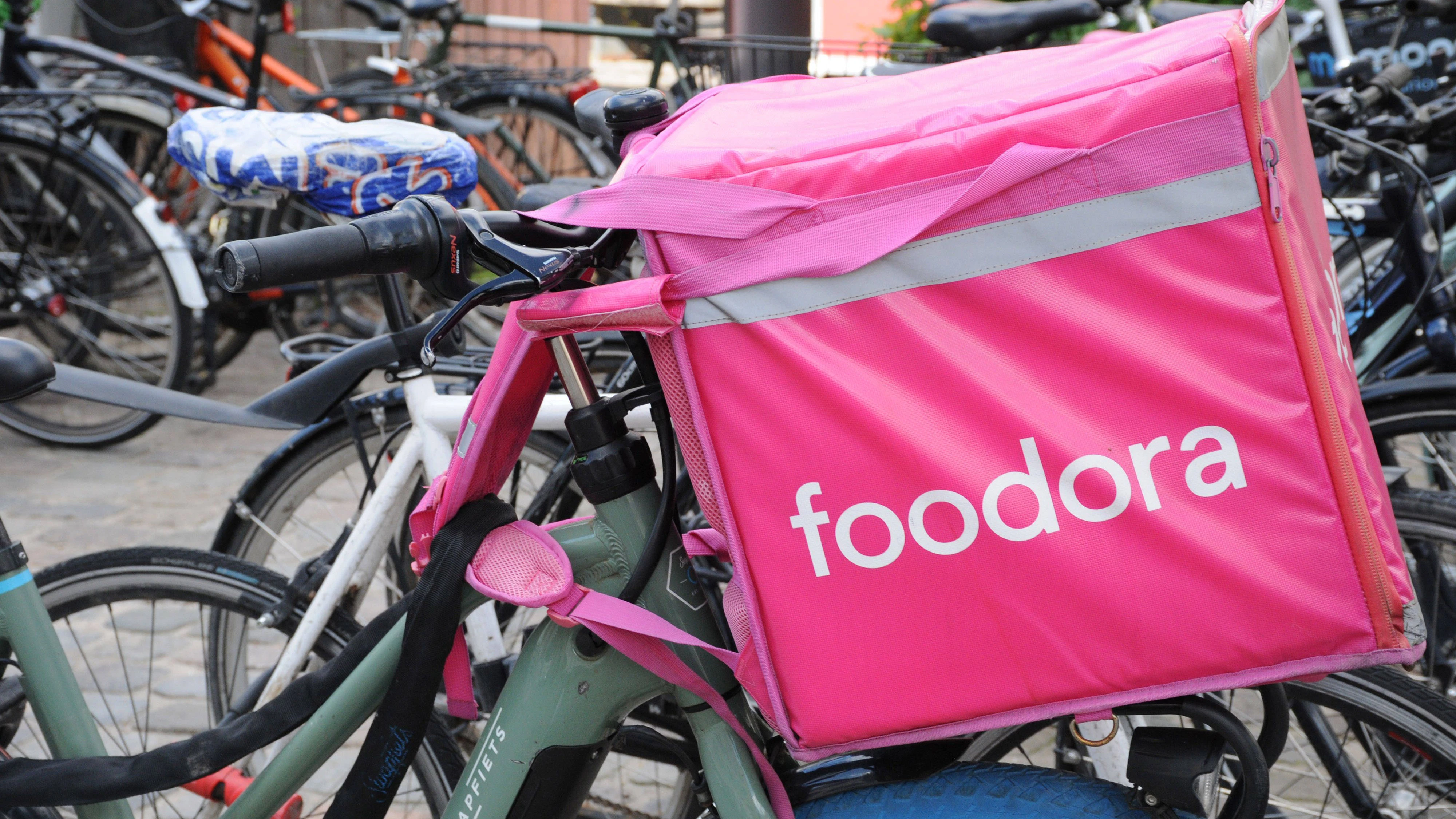 Copenhagen/ Denmark/12 August 2024/ Foodora delivery man in danish capital Copenagen Photo.Francis Joseph Dean/Dean Pictures Not for commercial use