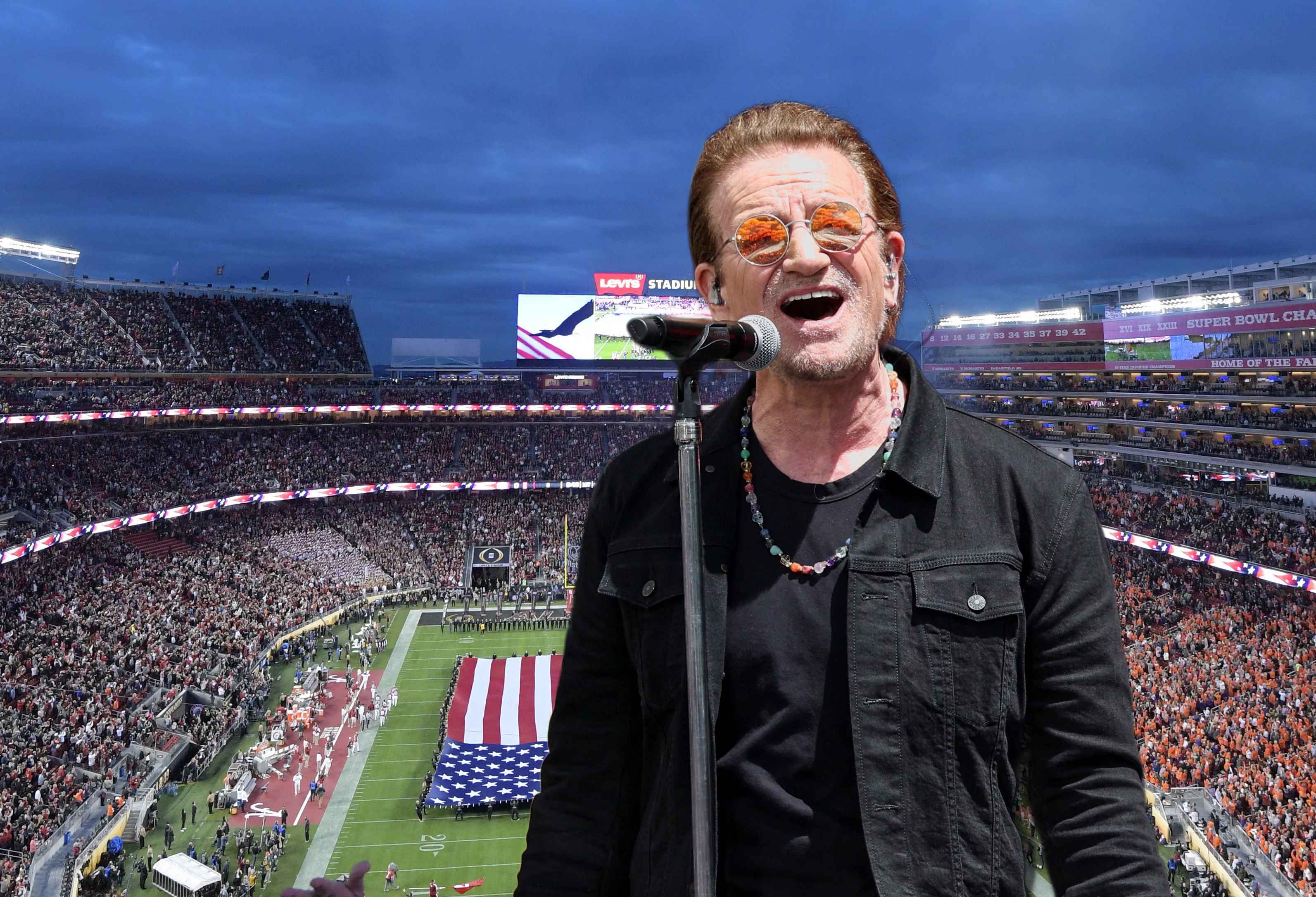 Bono in einem Stadion.