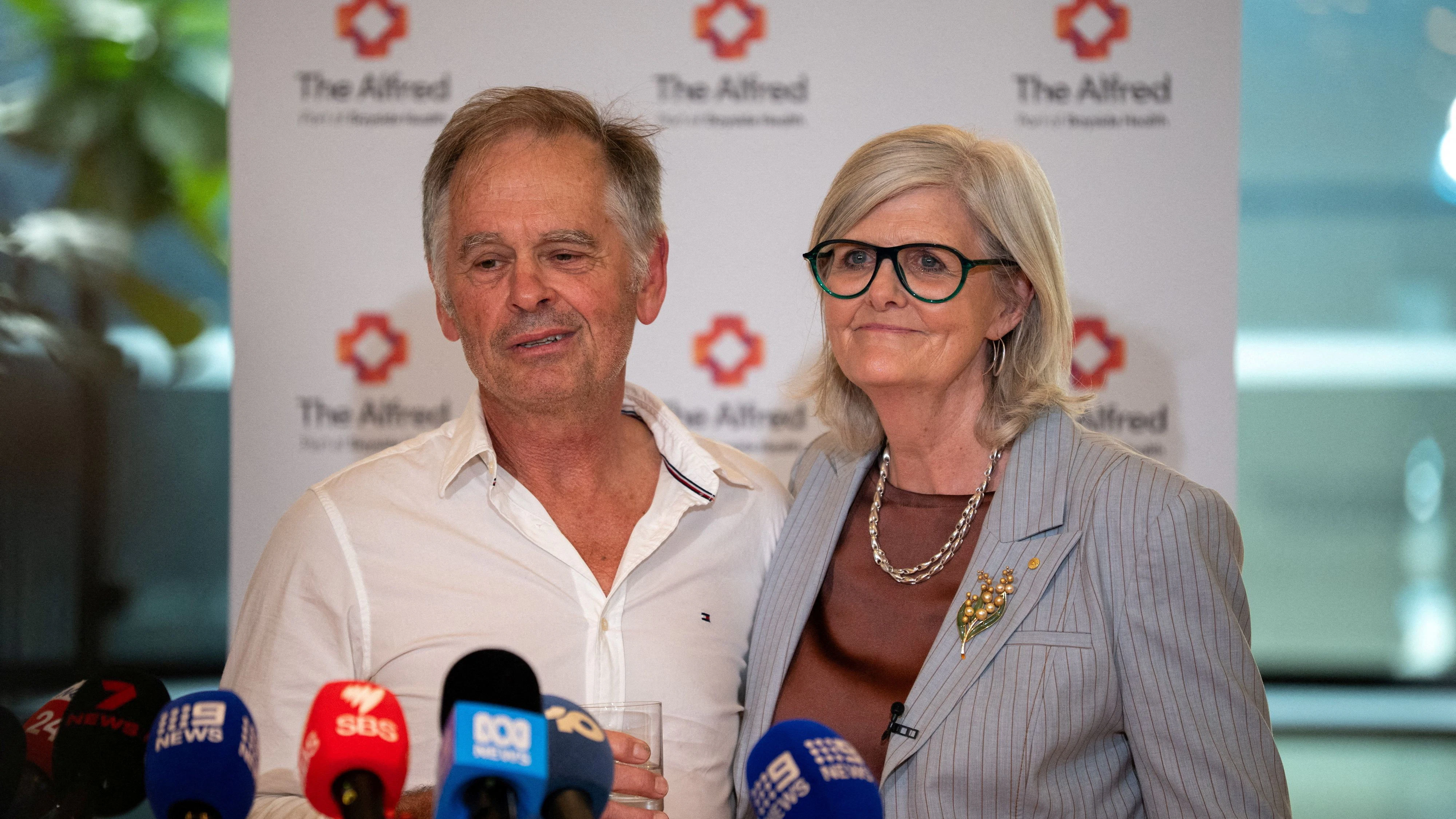 Phil Haines, husband of independent Australian lawmaker Helen Haines, announces that his wife has had both legs amputated after ​being rammed by a car outside her electoral office on Monday, during a press conference with Australia’s Governor-General Sam Mostyn, at Alfred Hospital in Melbourne, Australia, October 21, 2026.  AAP/Jay Kogler via REUTERS    ATTENTION EDITORS - THIS IMAGE WAS PROVIDED BY A THIRD PARTY. NO RESALES. NO ARCHIVE. AUSTRALIA OUT. NEW ZEALAND OUT. NO COMMERCIAL OR EDITORIAL SALES IN NEW ZEALAND. NO COMMERCIAL OR EDITORIAL SALES IN AUSTRALIA. REFILE - FIXING FORMATTING 