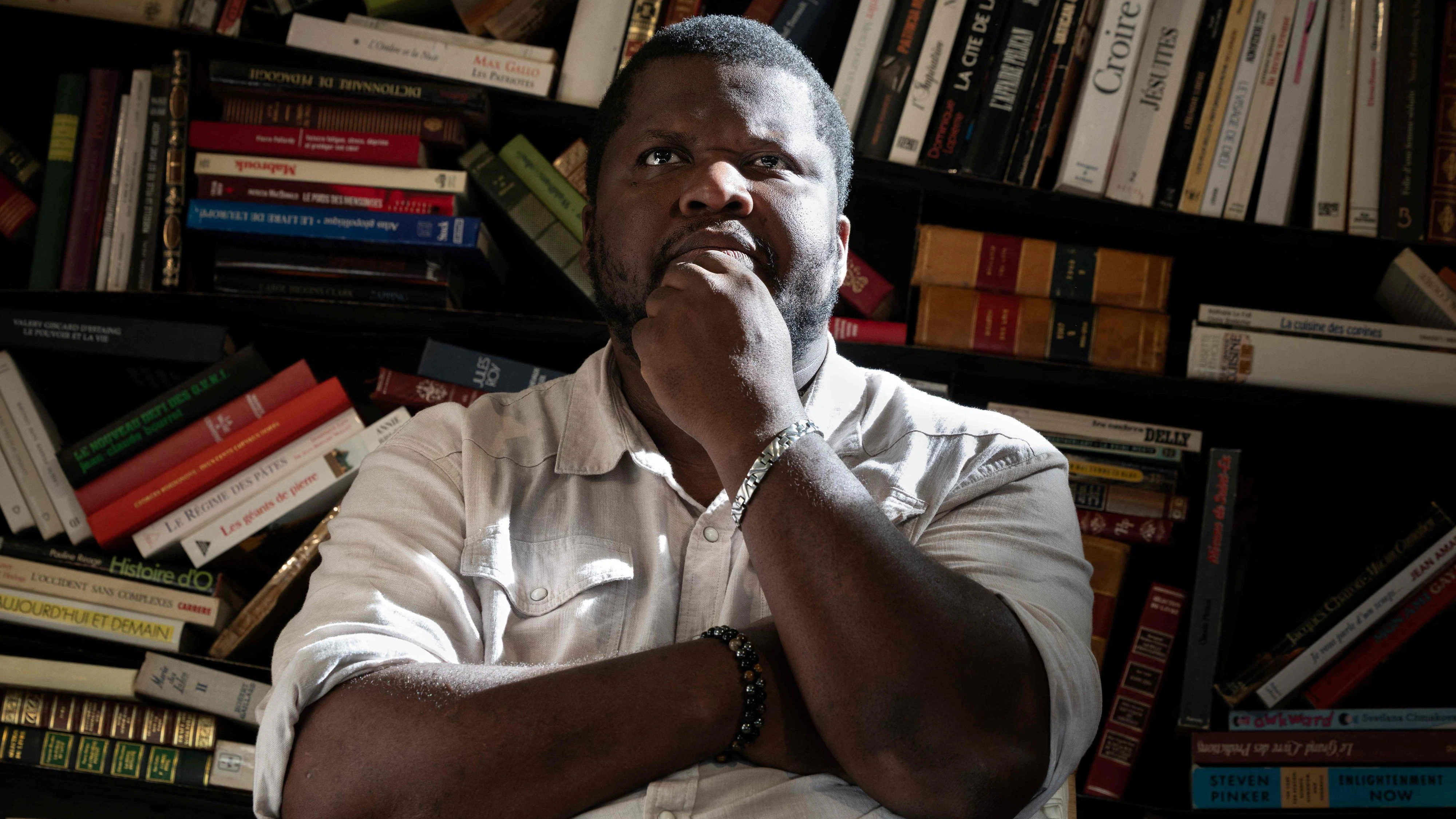 Canadian-Haitian novelist Thelyson Orelien looks on as he takes part in the 28th edition of "Les Correspondances" literature festival in Manosque, south-eastern France on September 24, 2026. (Photo by Joel Saget / AFP)