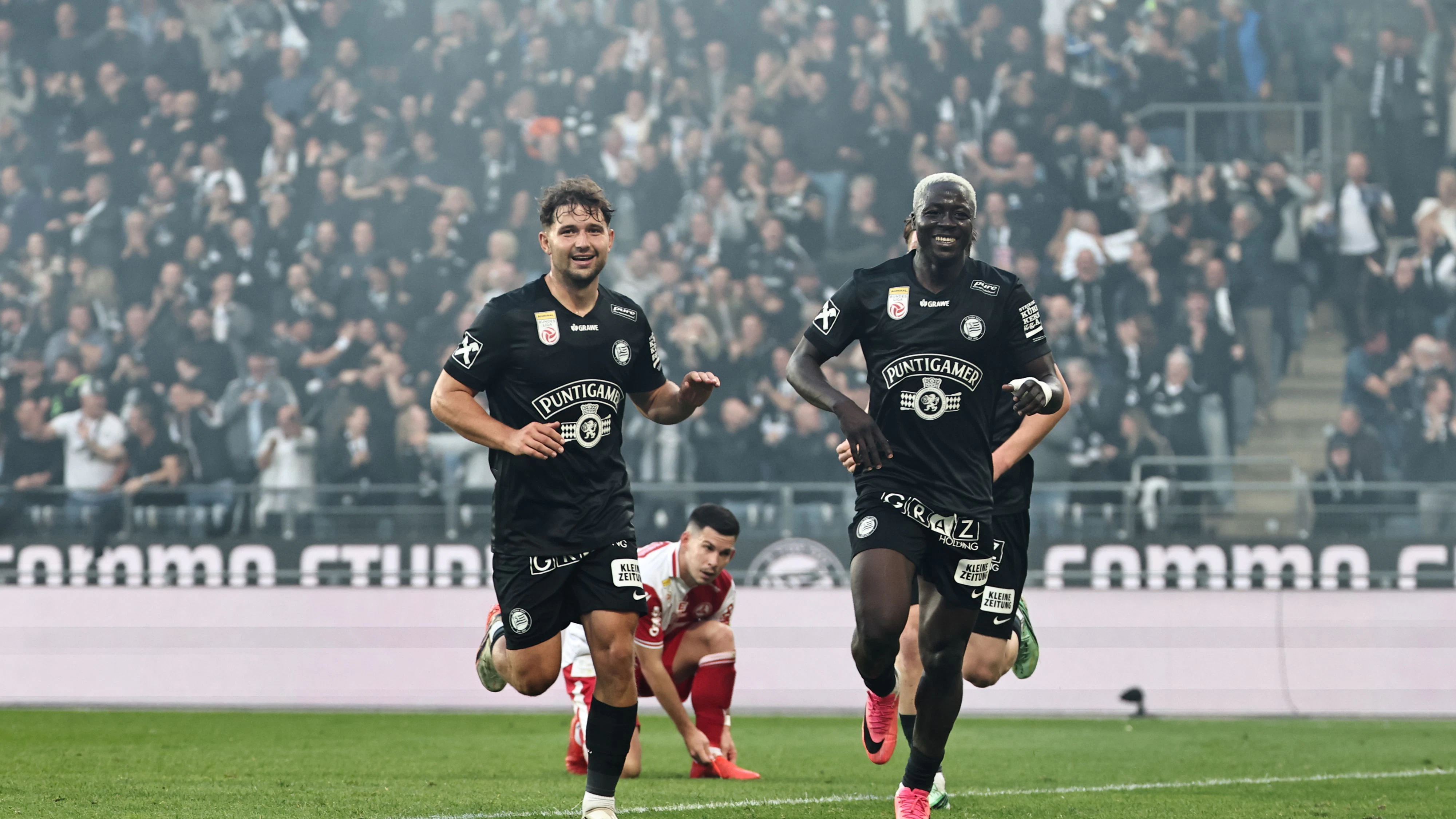 GRAZ,AUSTRIA,18.OCT.26 - SOCCER - ADMIRAL Bundesliga, SK Sturm Graz vs Grazer AK 1902. Image shows the rejoicing of Simon Seidl and Oumar Diakite (Sturm). Photo: GEPA pictures/ Chris Bauer
