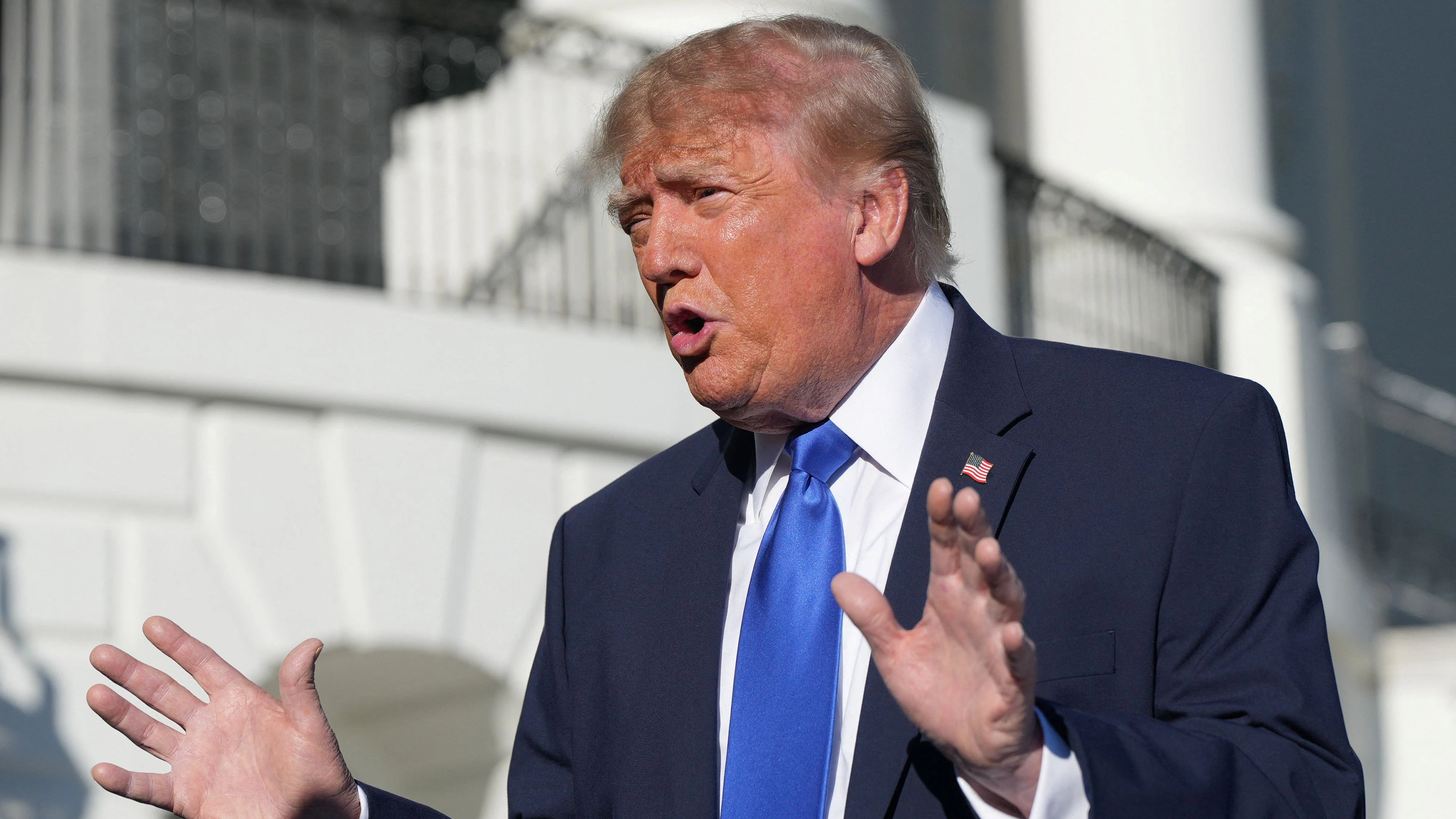 US President Donald Trump speaks to members of the media as he departs the White House en route to Iowa, in Washington, DC, US, October 22, 2026. REUTERS/Nathan Howard