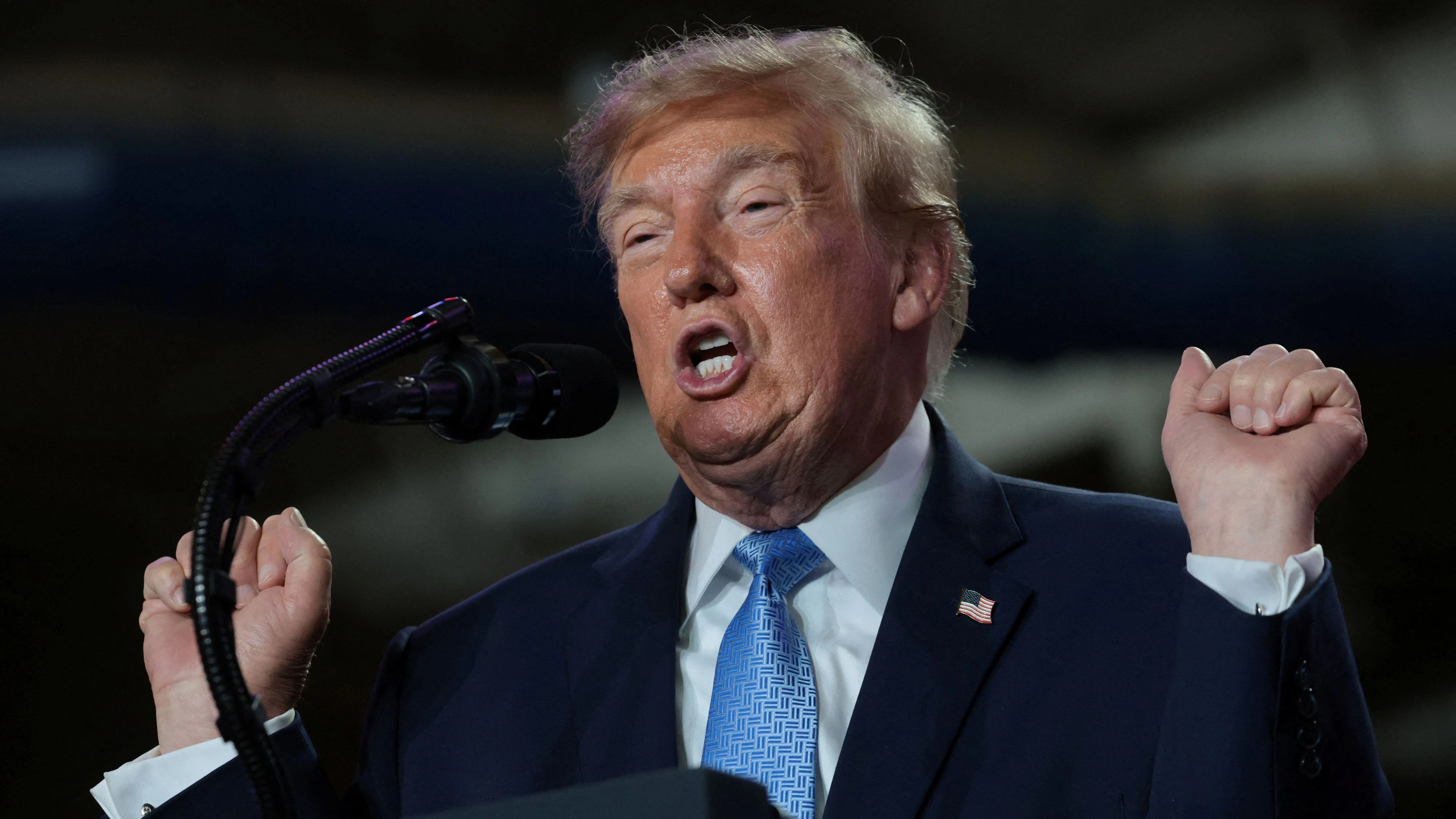 US President Donald Trump mocks transgender athletes as he delivers remarks to supporters at a midterm election campaign rally for incumbent US Senator Cindy Hyde-Smith (R-MS) at an arena in Corinth, Mississippi, US, October 26, 2026. REUTERS/Jonathan Ernst
